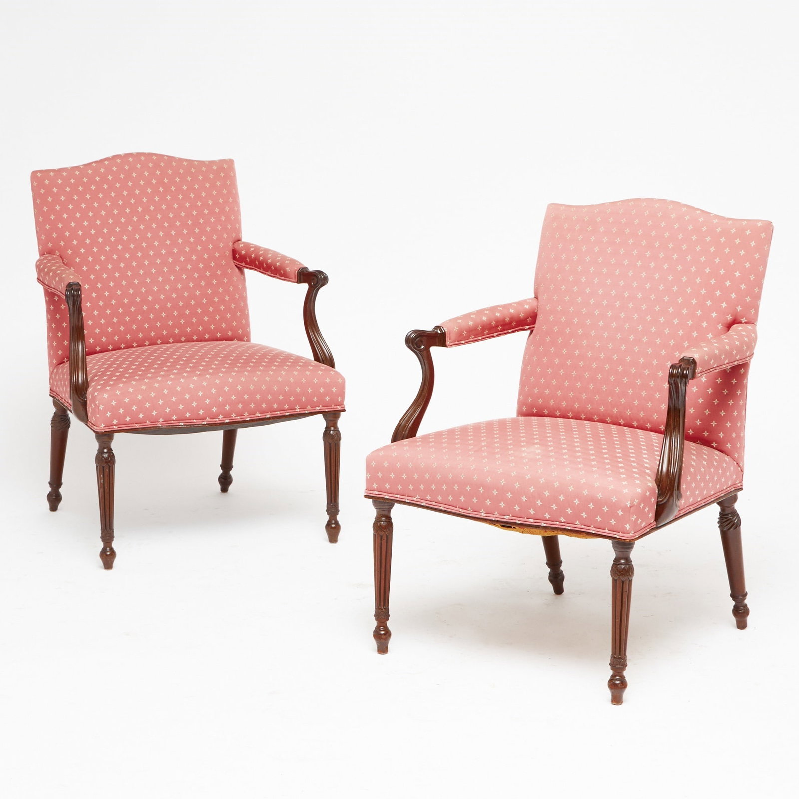 Pair of George III Upholstered Mahogany Armchairs: Late 19th centuryHeight 35 inches, width 23 1/2 inches, depth of seat 18 inches, height of seat 16 1/2 inches. soiling to upholstery; crack to one back leg; crack to one front leg; old marks and