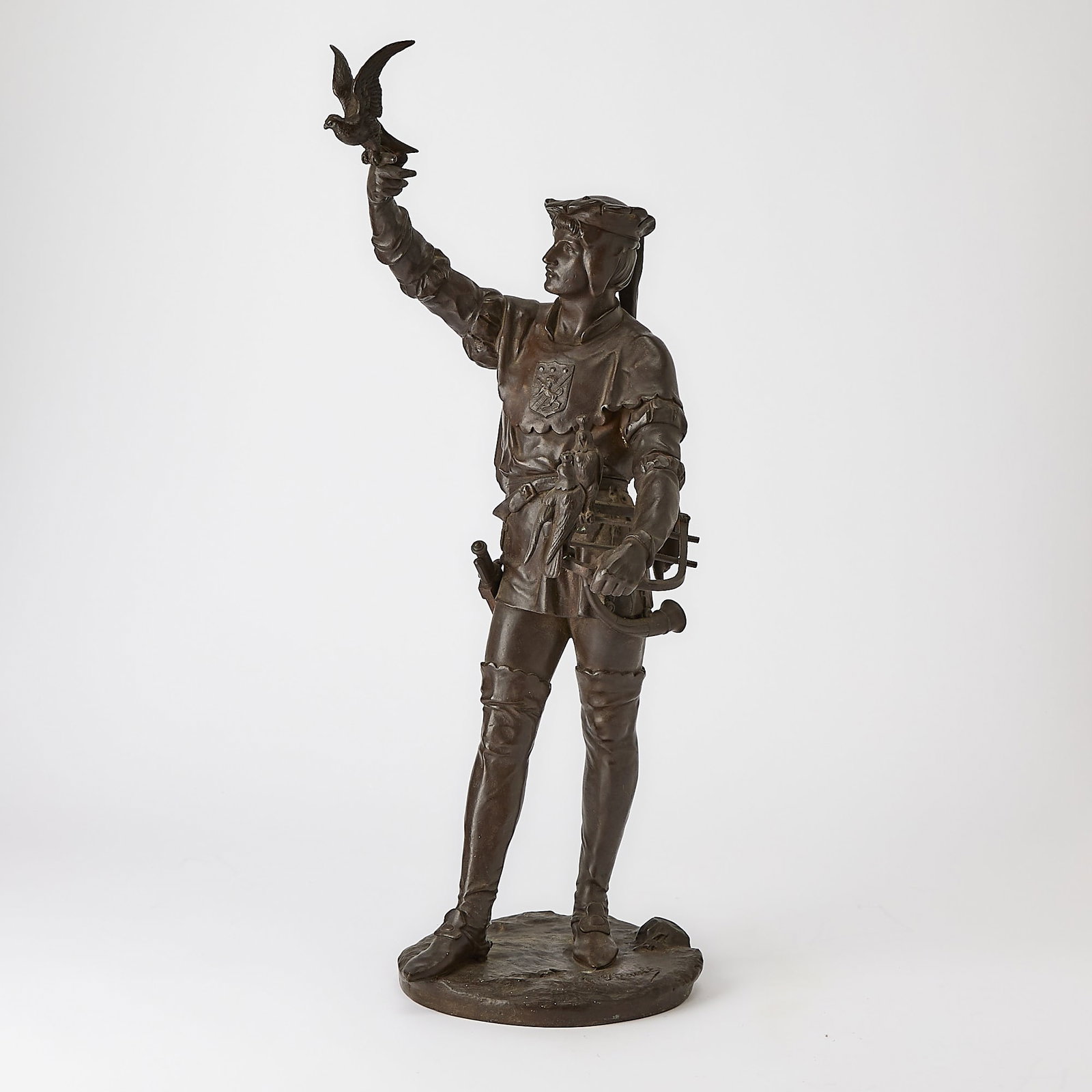 French Patinated Bronze Figure Titled Le Falconnier: Cast after a model by Emile-Louis Picault (1835-1915)Height 23 inches.
