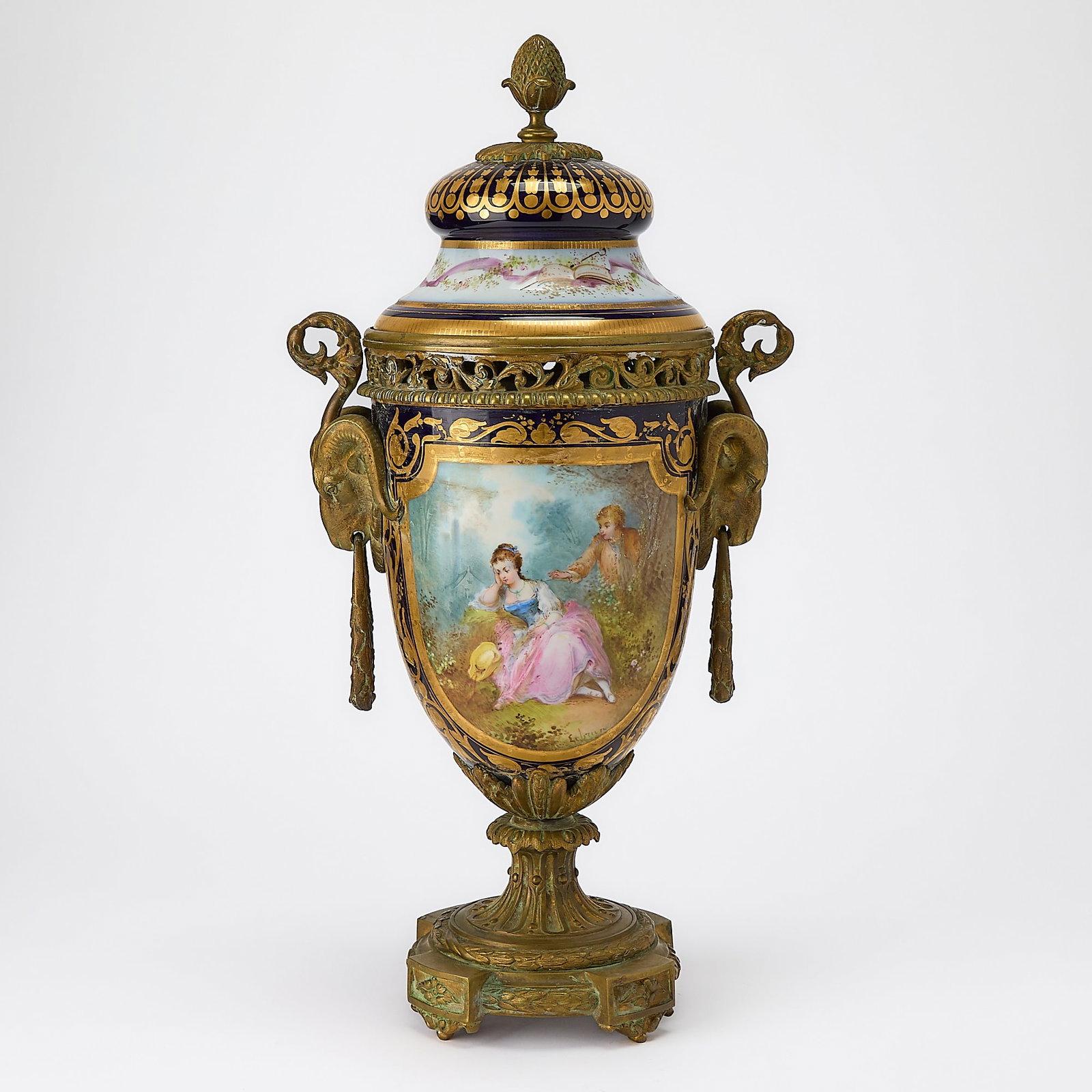 Sevres Style Gilt-Bronze-Mounted Porcelain Covered Urn: Circa 1900 Height 19 1/2 inches. vase wobbly on base; remnants of old polish throughout