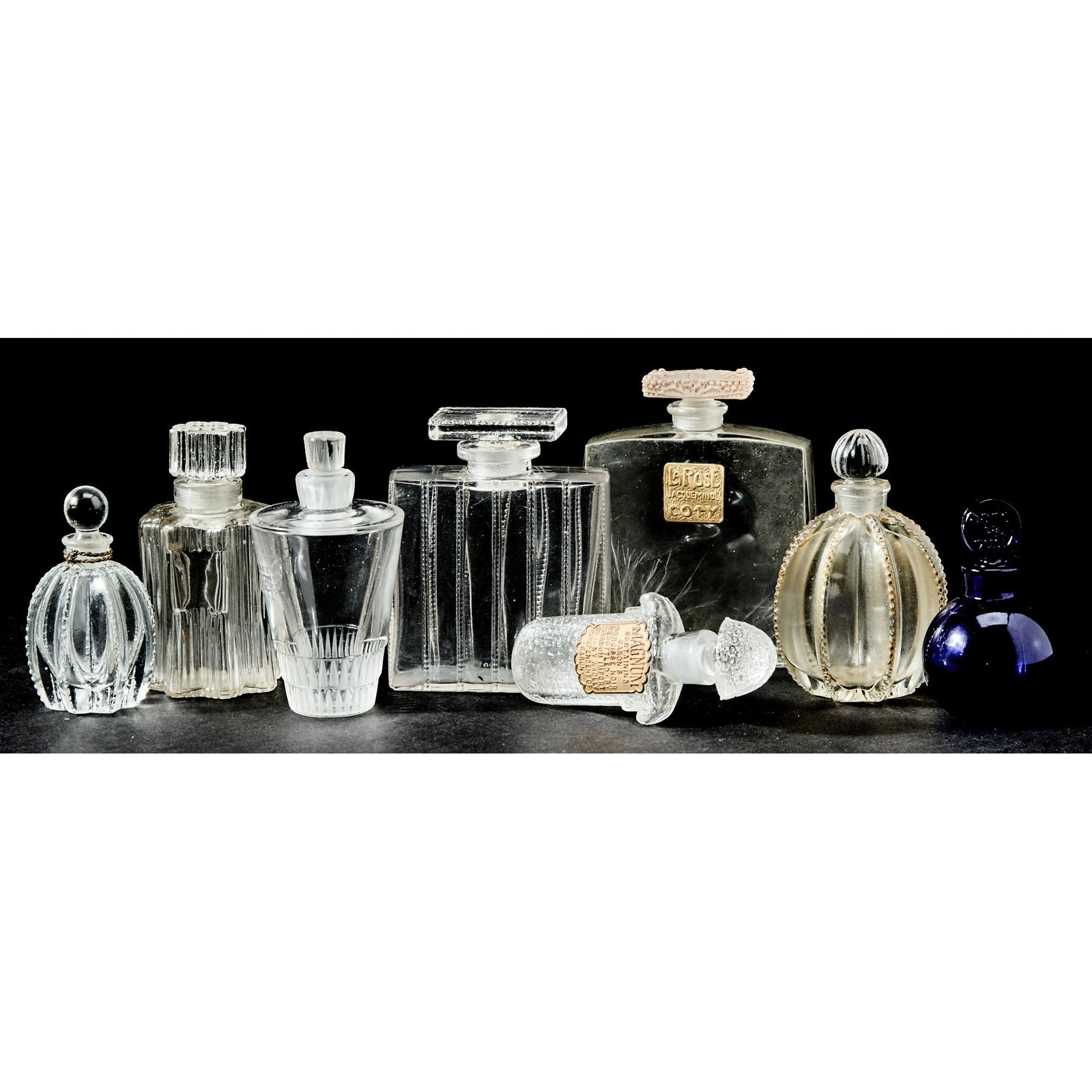 Seven Lalique Molded Glass Perfume Bottles (1 of 6)