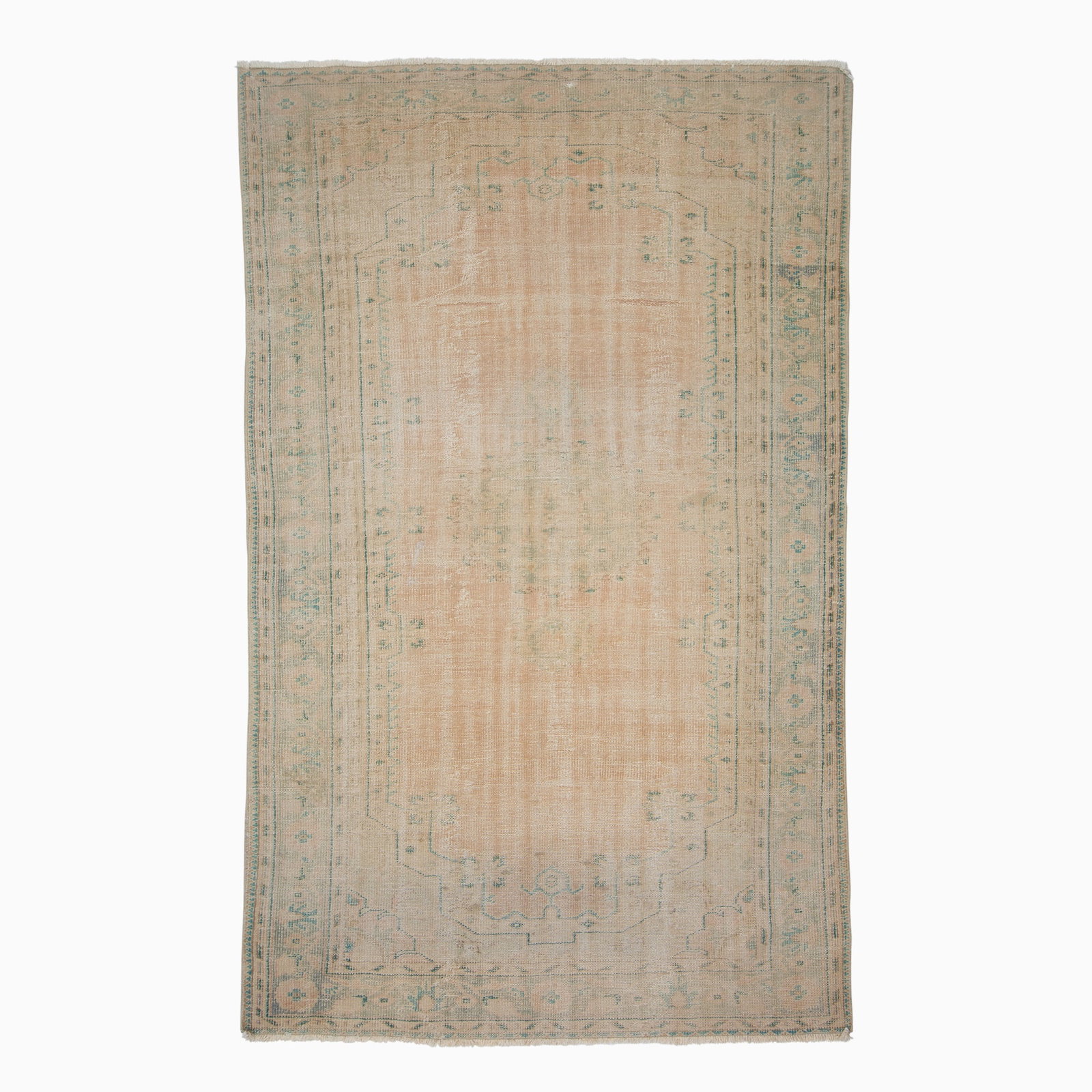 Indo-Oushak Carpet: India, Mid-20th Century The open peach field with a central pendant medallion is within a slate floral vinery border. (9' 11" x 6' 4") Overall wear, re-wrapped selvedges, chemically washed, stain