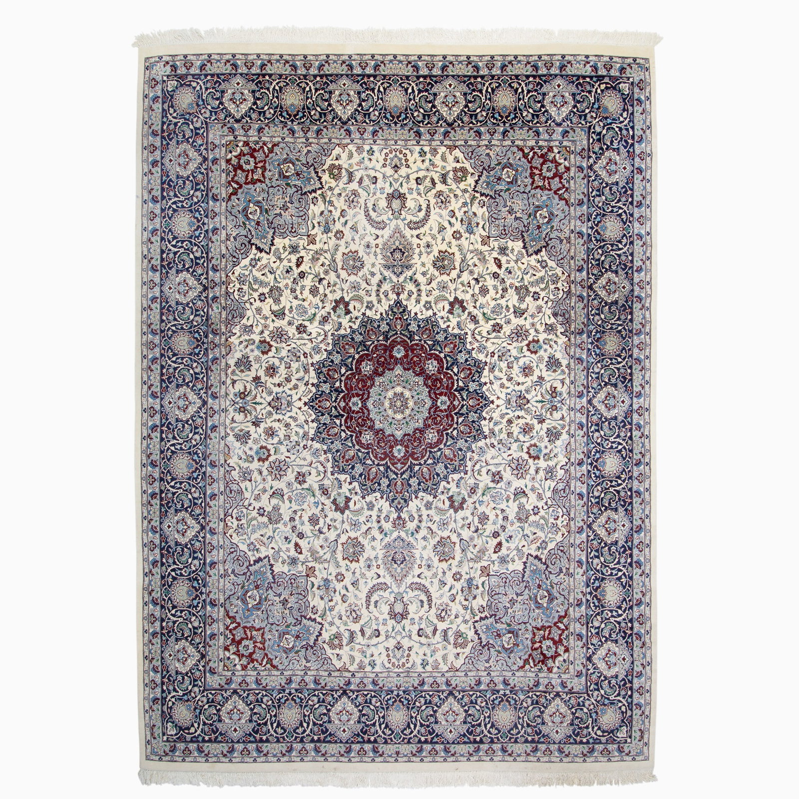 Indo-Isfahan Carpet: India, ContemporaryThe central circular pendant medallion on the ivory field flanked by complementary spandrels is within an indigo palmette and vine border. Approximately 144 kpsi. (14' 0" x 10'