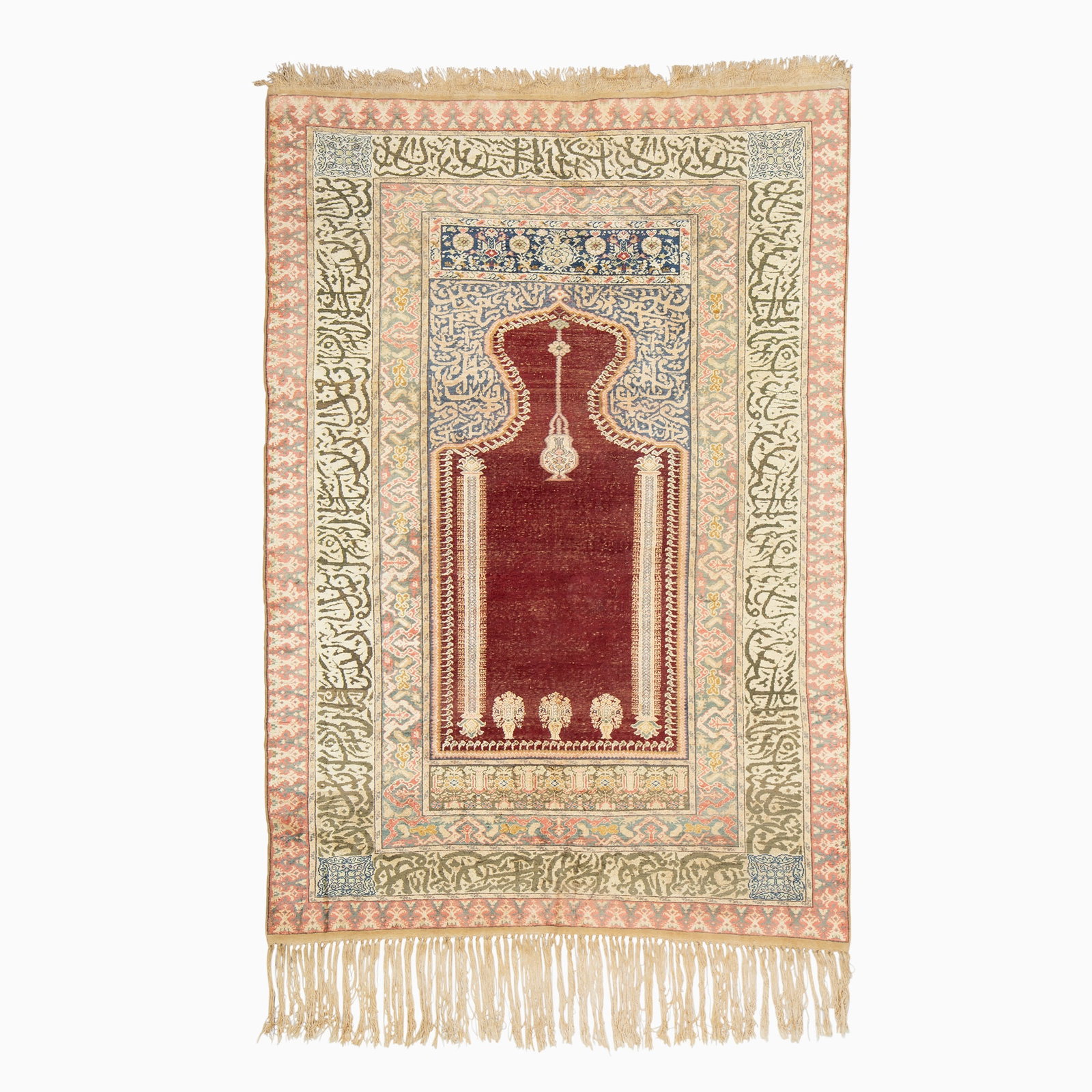 Kayseri Cotton Prayer Rug: Central Anatolia, 2nd 1/4 20th CenturyThree flowering vases, two columns, and a hanging mosque lamp on the open crimson field beneath a curved niche and indigo spandrels are within an ivory border