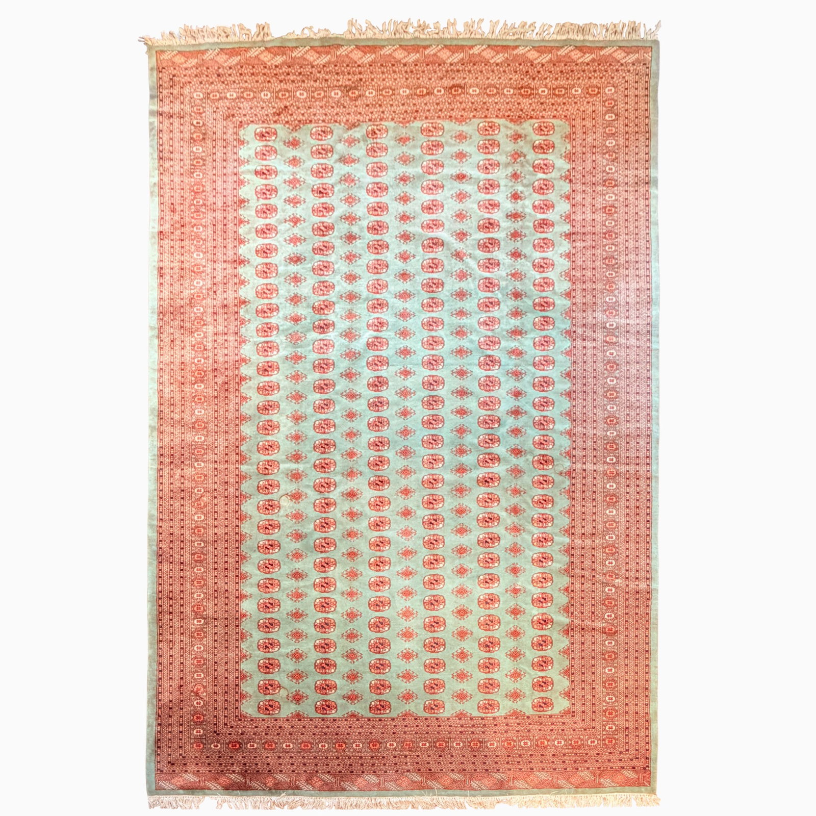 Pakistan Bokhara Rug: Pakistan, Contemporary The celadon field with six columns of gul medallions is within a stylized rosette border. (12' 4" x 9' 3")