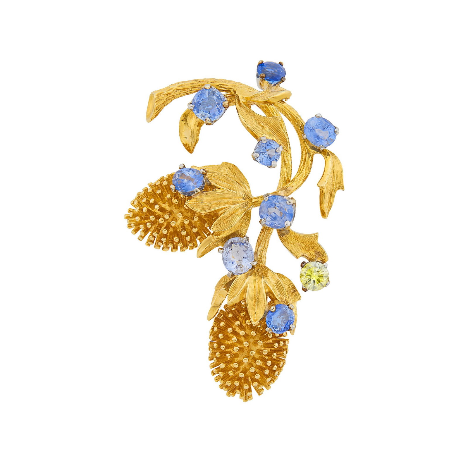 Gold, Platinum, Sapphire and Colored Diamond Thistle Brooch: 8 round and oval sapphires ap. 4.45 cts., one light yellow round diamond ap. .50 ct., signed SC, ap. 16.6 dwts. The colored diamond has not been tested.Tests as 18 kt. Sapphires: medium light pastel c