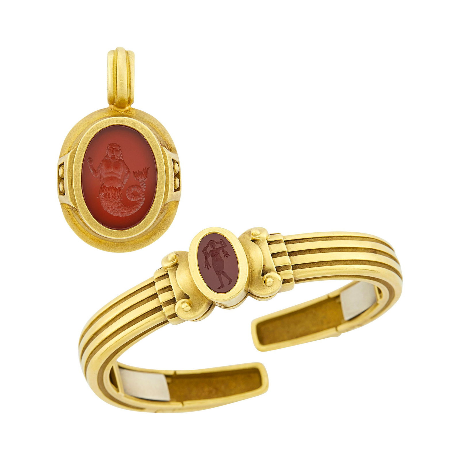 Barry Kieselstein-Cord Gold and Carnelian Intaglio Bangle Bracelet and Pendant: 18 kt., 2 oval carnelian intaglios, signed Kieselstein-Cord, B. Kieselstein-Cord, 1985, ap. 37.8 dwts. Inner cir. 5 7/8 inches, with hinged open back.
