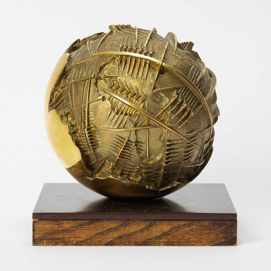 Arnaldo Pomodoro: Italian, 1926-2025 Sfera per Galerie Kriwin, 1977 Signed and editioned Arnoldo Pomodoro 6/30 on the base Bronze 5 7/8 x 5 7/8 x 5 7/8 inches (15 x 15 x 15cm) Provenance: Galerie Kriwin, Brussels