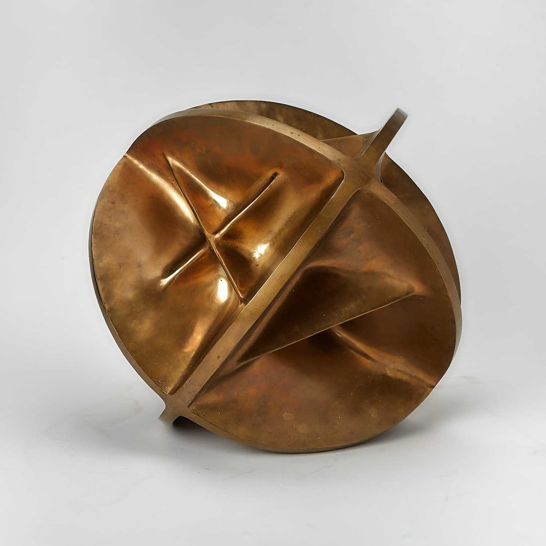 Gio Pomodoro: Italian, 1930-2002 Radiale, 1966 Stamped with artist's initials, date and edition GP 66 1/3 on the side Polished Bronze 17 x 17 x 17 inches (43.2 x 43.2 x 43.2cm) Provenance: Private Collection