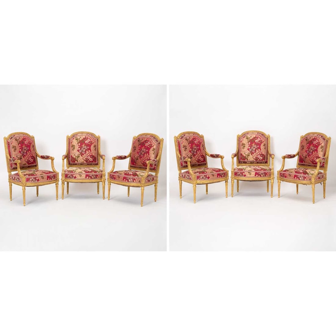 Set of Six Louis XVI Carved Giltwood Fauteuils à la Reine: Possibly by Jean-Baptiste Sené, circa 1780 Each with foliate-carved and beaded arched padded back, arms and bow-fronted seat, on turned tapering fluted legs carved with paterae and terminating in