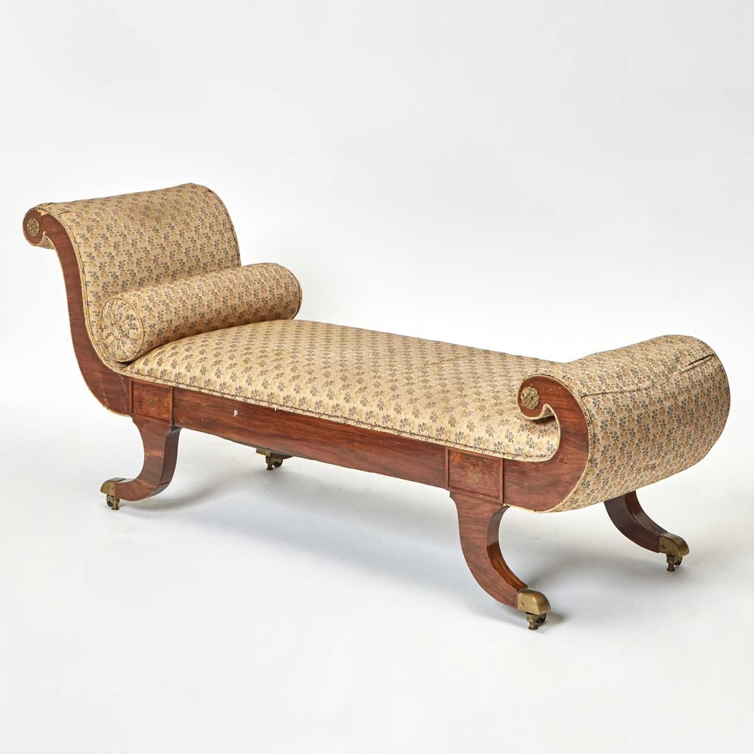 Regency Brass-Inlaid Rosewood Daybed: Early 19th century Height 30 inches (76.2 cm), width 66 1/2 inches (168.9 cm), depth 21 1/2 inches (54.6 cm). Age cracks, rippling and losses to veneers.