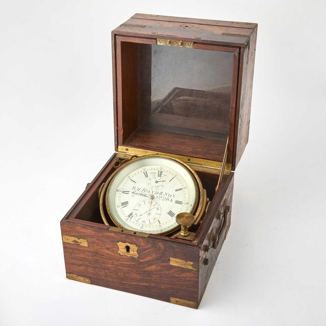 Victorian Rosewood & Brass Two-Day Marine Chronometer: By WILLIAM BOND & SON, NO. 284., circa 1870 Dial diameter 5 inches (12.7 cm), box height 7 7/8 inches (19.9 cm), width 7 1/8 inches (18.2 cm) square. Not running, winding key included, box key not