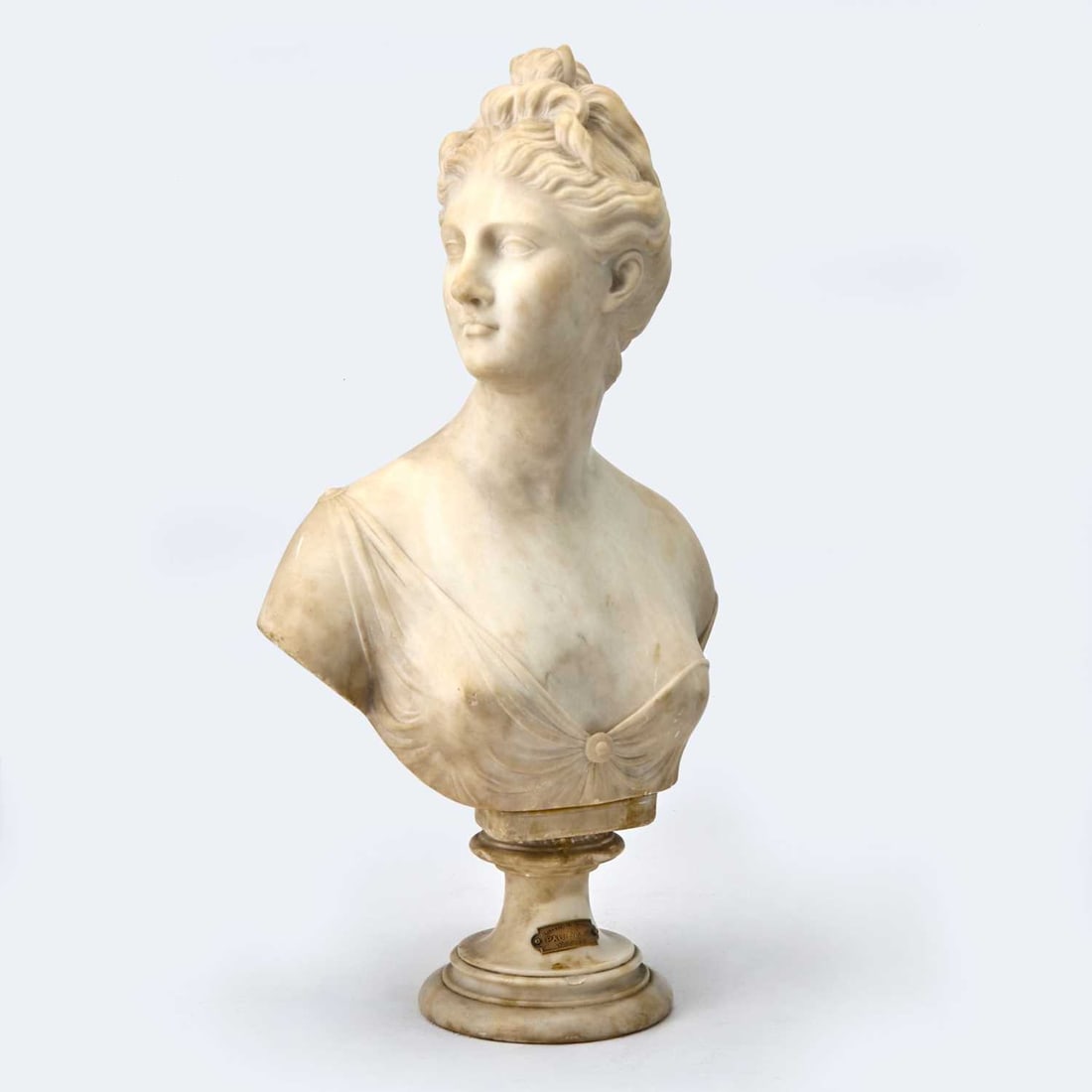 White Marble Bust of a Lady, After Jean-Antoine Houdon (French, 1741-1828): Indistinctly signed Houdon Height 25 inches (63.5 cm). Restoration to socle