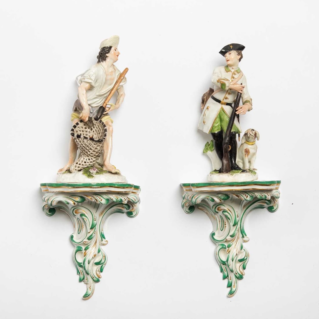 Two Meissen Figure Groups Together a Pair of Chamberlain & Co. Worcester Porcelain Wall Bracket: Mid-18th century, by J.J. Kändler Realistically modeled as a Fisherman and Hunter with dog, with blue crossed swords mark to side, height 7 1/4-7 1/2 inches (18.4-19 cm). Together a Pair of Chamb