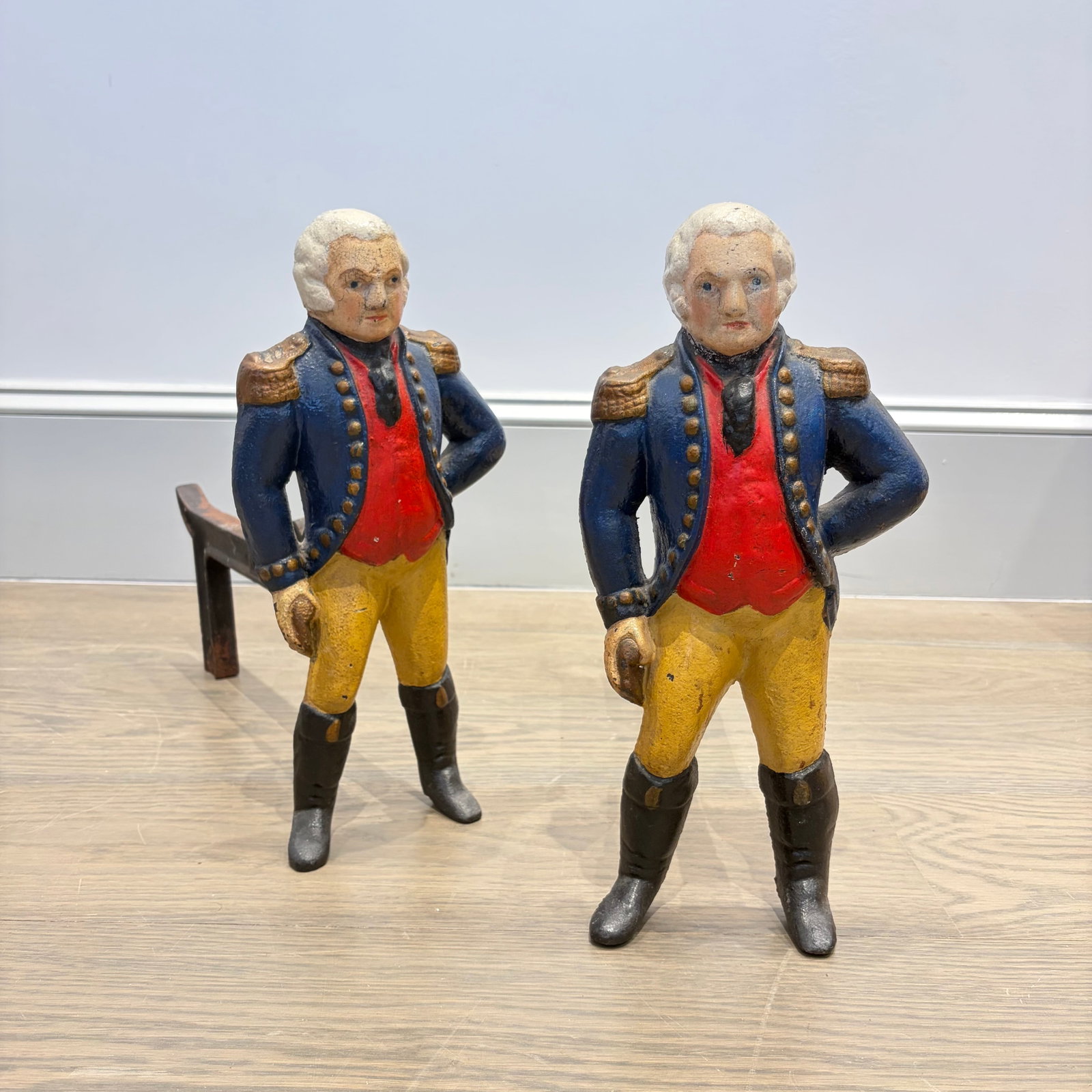 Pair of George Washington Figural Polychrome Cast Iron Andirons: Late 19th/early 20th century Height 14 1/2 inches, width 6 1/2 inches, depth 16 inches
