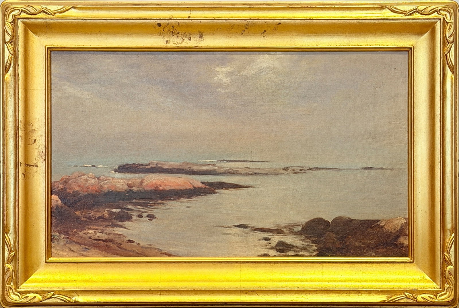 Ernest Ludwig Ipsen: American, 1869-1951 Dread Ledge off Swampscott Signed E L Ipsen (lr); signed and titled on the reverse Oil on canvas 14 x 24 inches Framed 20 1/4 x 30 1/4 inches Provenance: Skinner, Marlborough,