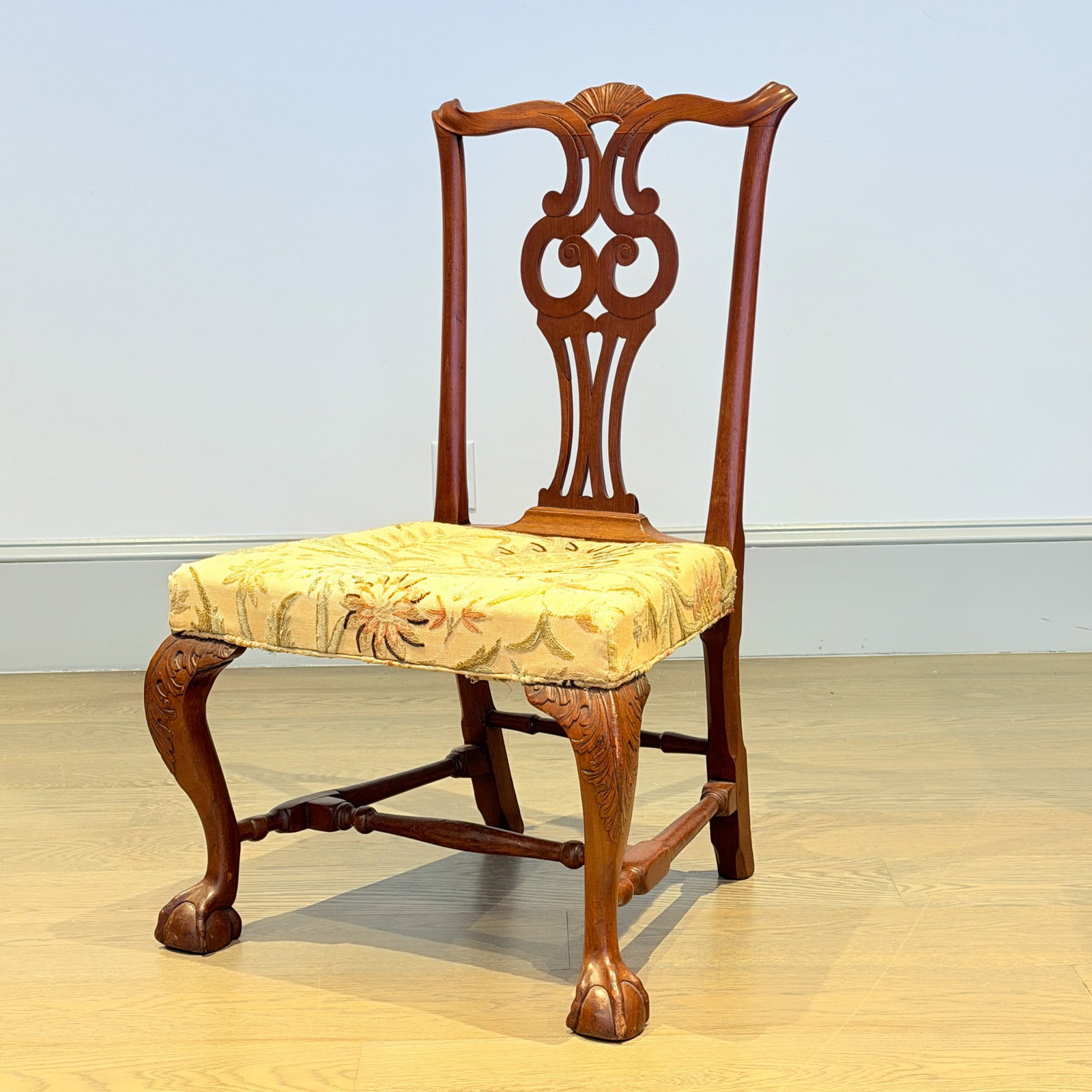 Chippendale Mahogany Side Chair: Probably Boston, Massachusetts, 1760-80 The serpentine crest above a pierced owl splat and overupholstered seat with frontal cabriole legs with acanthus-carved knees ending in claw-and-ball feet.
