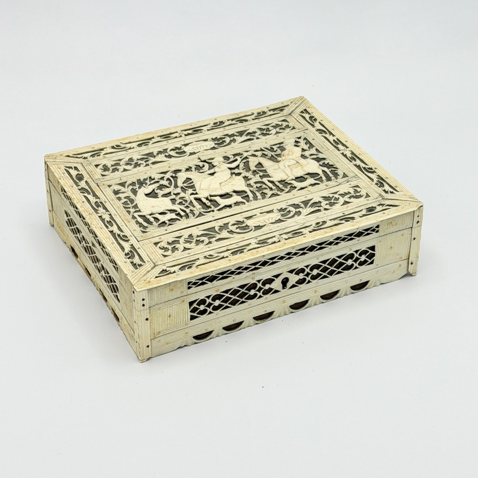 Pierced Bone Sewing Box: Attributed to the French prisoner Johann De La Paz, Norman Cross Prison, Huntingdonshire, England, late 18th/early 19th century The hinged lid with a pierced central reserve surrounded by pierced,