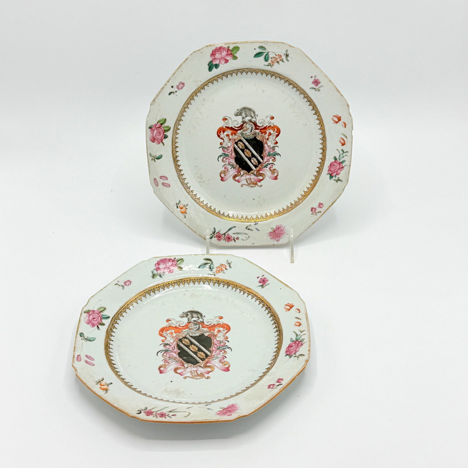 Pair of Octagonal Chinese Export Armorial Porcelain Plates: 18th century With border of floral blossoms. Diameter 9 inches.