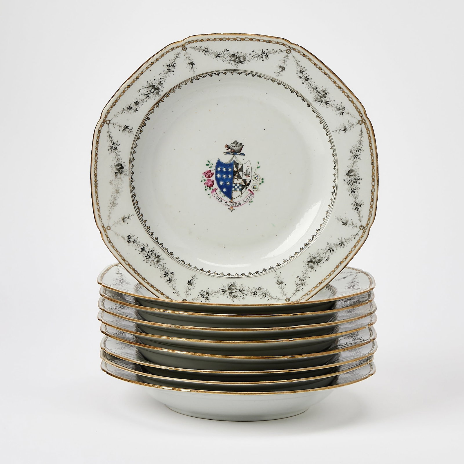 Set of Eight Chinese Export Armorial Porcelain Plates: Late 18th century Each with arms of Baillie impaling Campbell, bordered by sparse floral decoration. Diameter 9 1/2 inches.