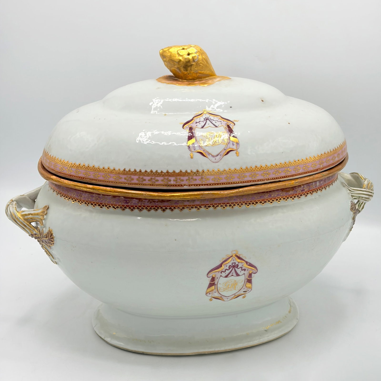 Chinese Export Porcelain Soup Tureen: First half 19th century With artichoke finial and twisted vine handles with leaf terminals, the gilt and enamel decoration including draped shields each centering a monogram. Height overall 11 3/4 inc