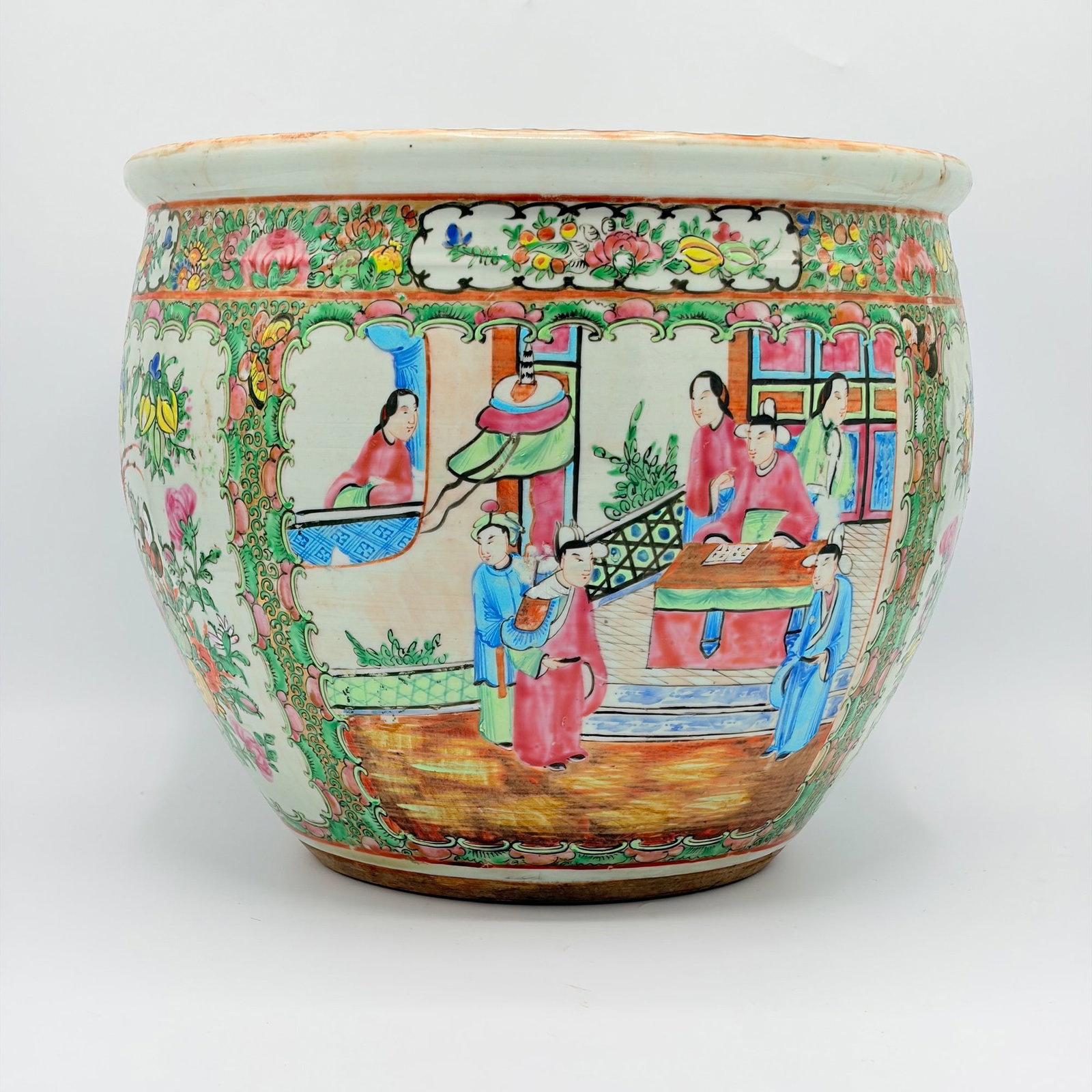 Pair of Chinese Export Porcelain Rose Medallion Planters: 19th century Height 10 inches, diameter 12 inches.