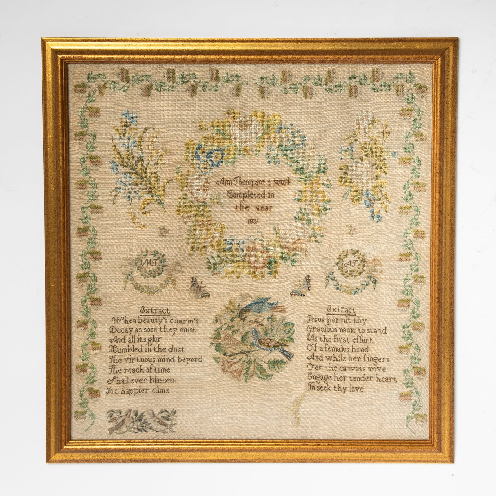 Needlework Sampler "Ann Thompson": Westtown School, New Jersey, 1831 Worked in silk threads on a coarse linen ground, with a strawberry border on three sides, a central floral wreath with the maker's name and date, two smaller wreaths