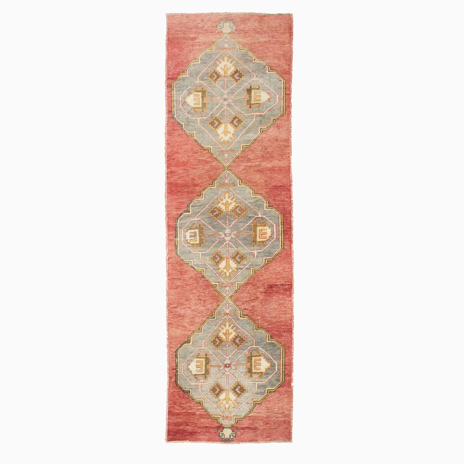 Oushak Runner: West Turkey, Mid-20th Century With three geometric medallions on an open madder field. (8' 11" x 2' 8")