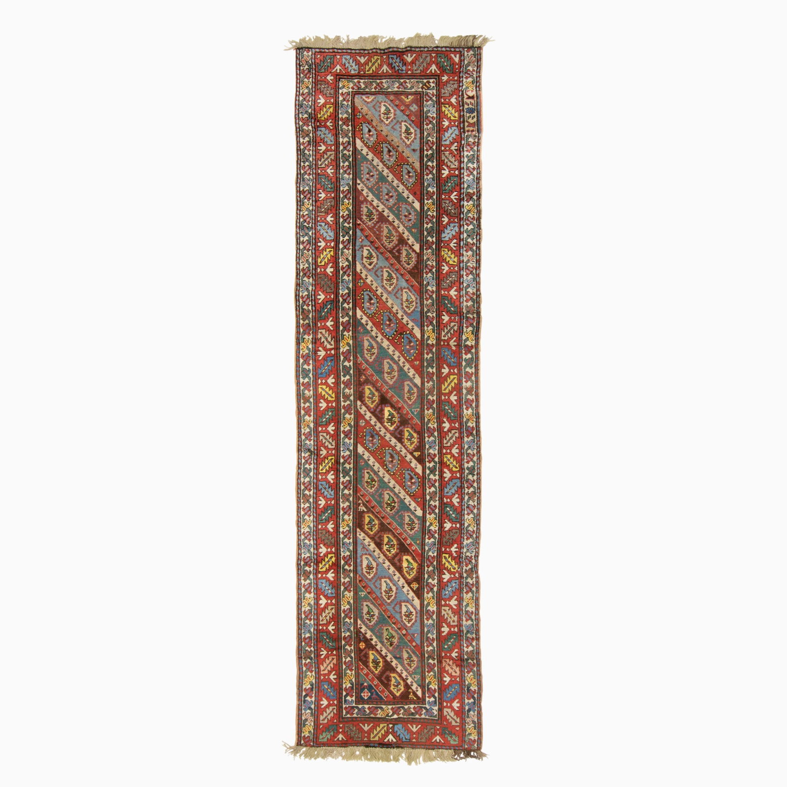 Gendje Runner: Southwest Caucasus, Circa 1900 The allover boteh pattern oriented in polychrome diagonal stripes is within a madder serrated leaf and calyx border. (11' 7" x 3' 2")