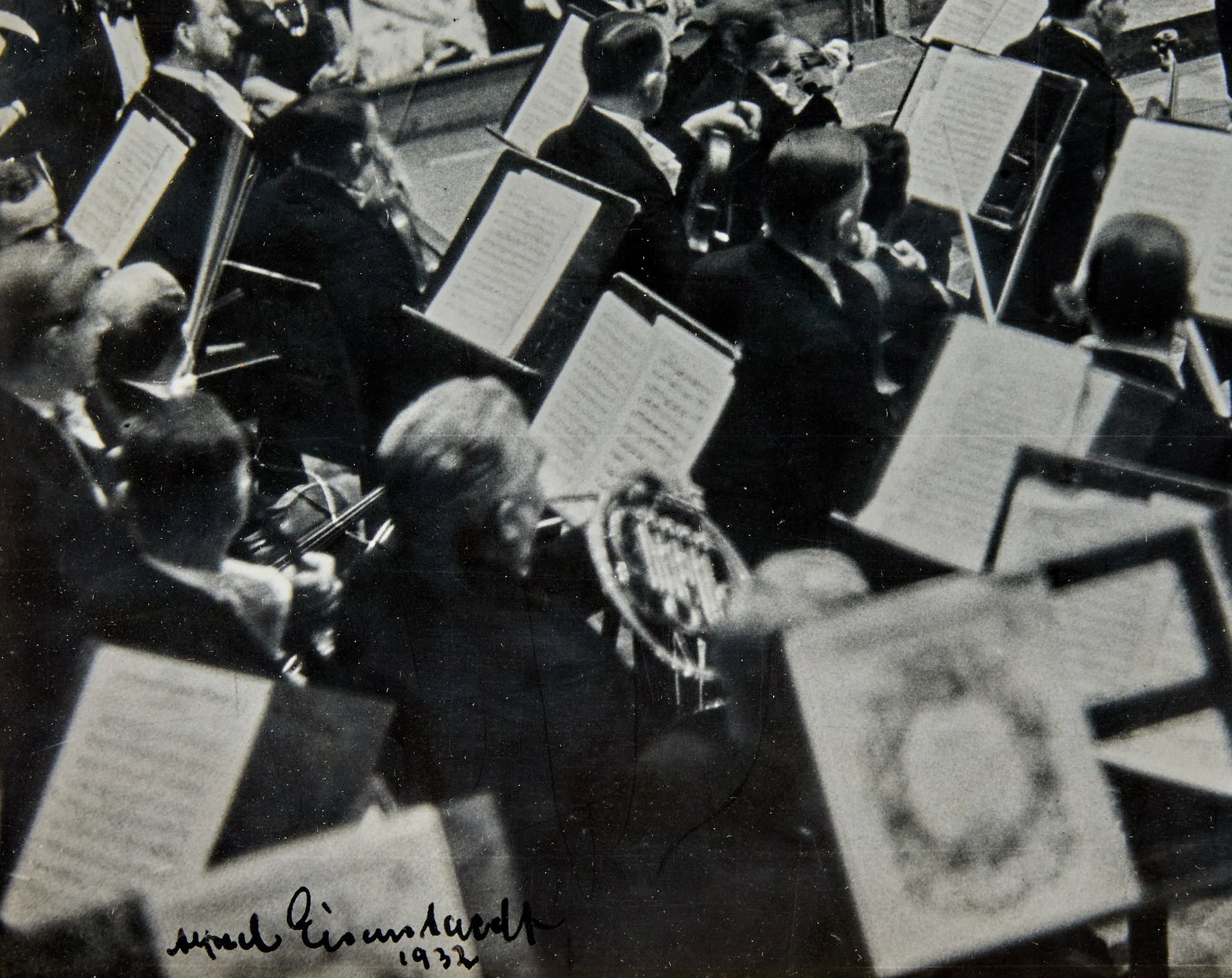 Alfred Eisenstaedt, Bruno Walter conducting the Berlin Philharmonic, 1932: EISENSTAEDT, ALFRED Bruno Walter conducting the Berlin Philharmonic, 1932, printed 1940s-1950s. Gelatin silver print, dry-mounted to card, 10 3/8 x 13 1/8 inches (264 x334 mm), signed and dated in ink