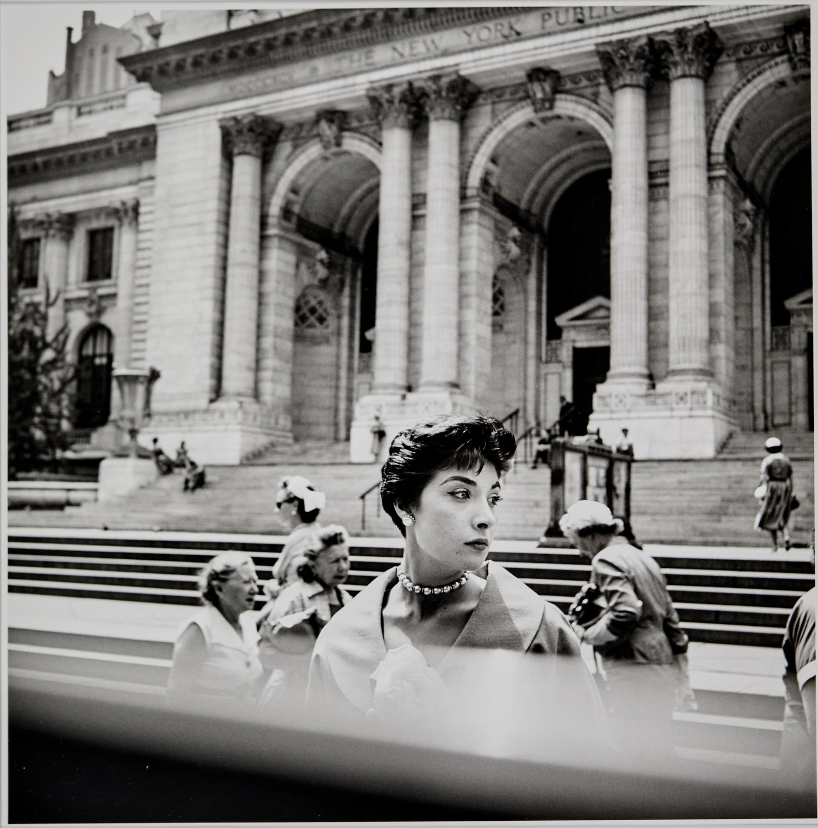 Vivian Maier, New York Public Library, NY, n.d.: MAIER, VIVIAN (1926-2009) New York Public Library, NY, n.d., printed later. Gelatin silver print, 12 x 12 inches (305 x 305 mm) on larger sheet (20 x 16 inches), photographer's collection stamp signed