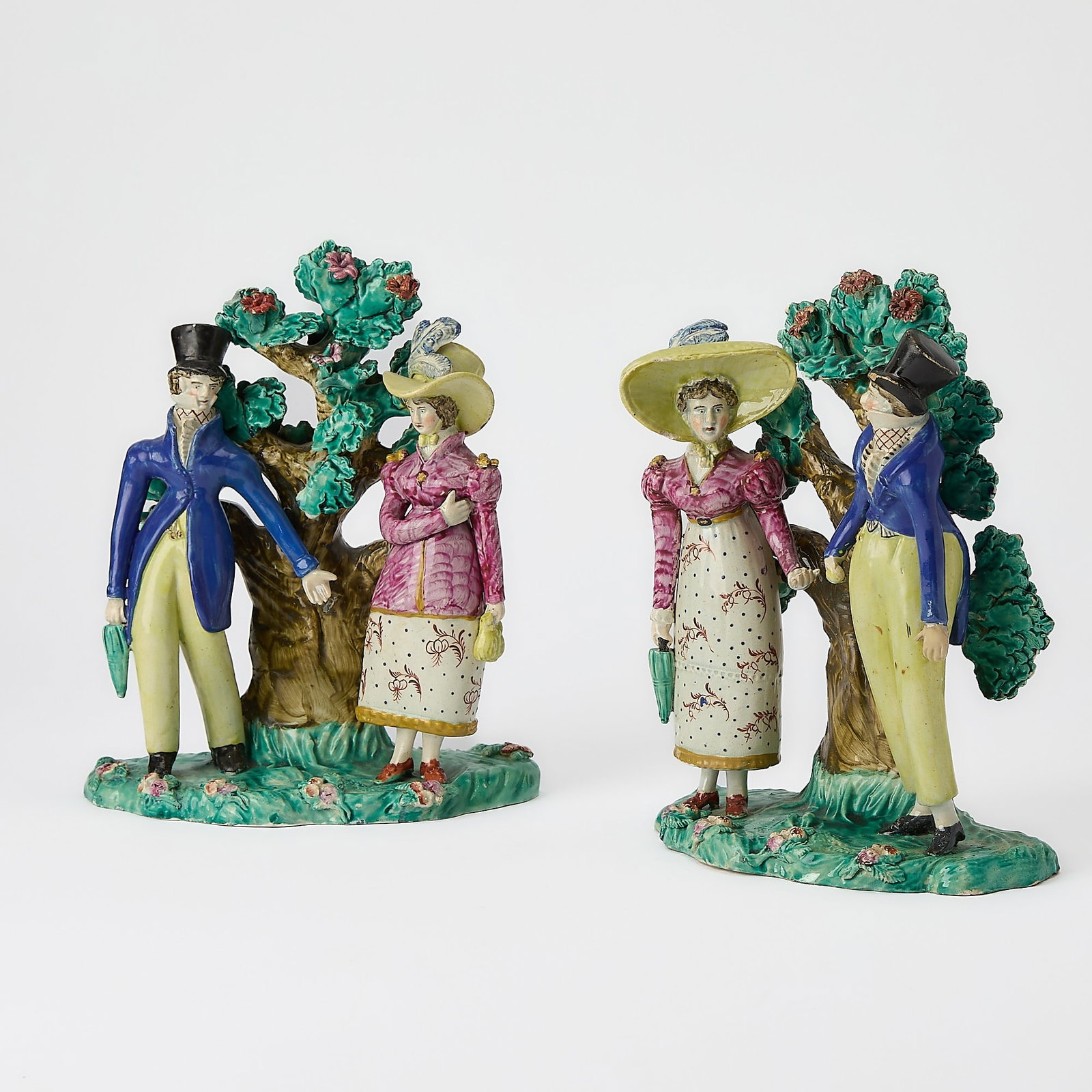 Two Staffordshire Pearlware Group of a Courting Couples: Circa 1825 Height 9 1/4 inches.