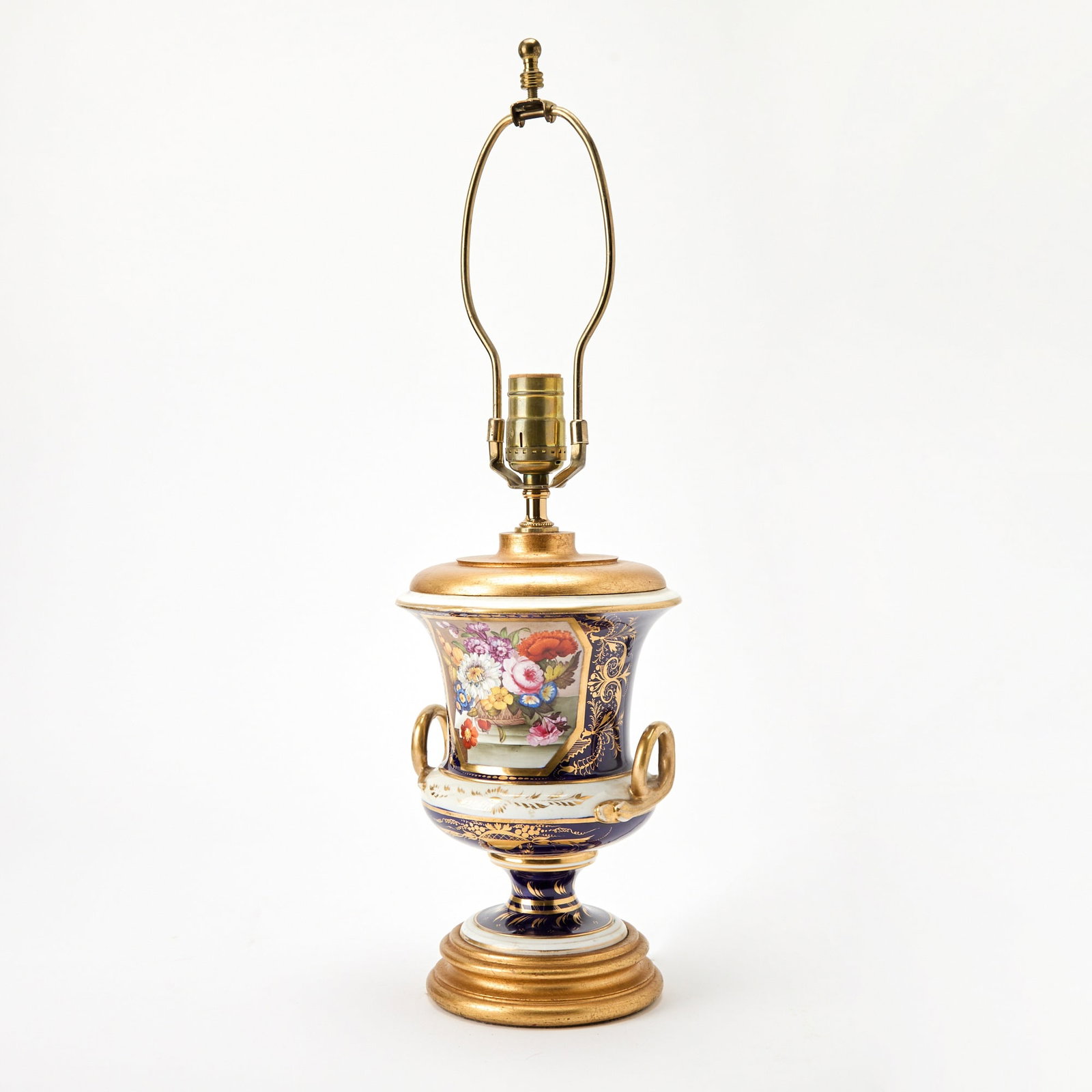English Porcelain Blue-Ground Campana Vase Mounted as a Lamp: Circa 1820-1830 Height 8 inches.