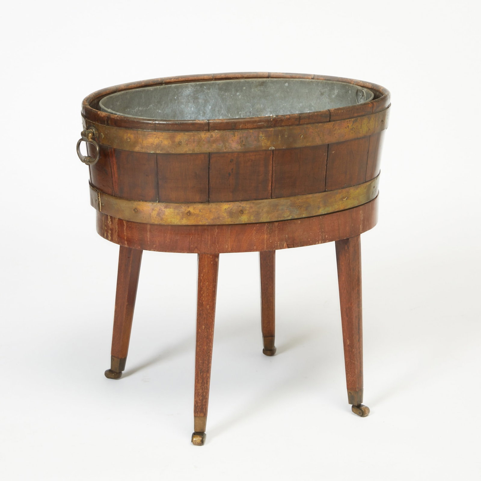 Brass Bound Mahogany Jardiniere on Stand: Height 24 inches, width 25 inches, depth 17 1/4 inches.