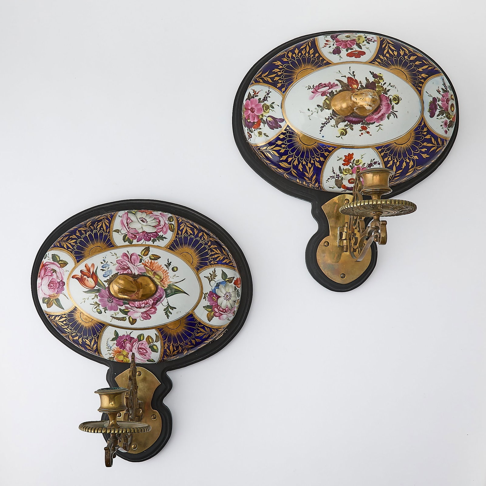 Pair of English Porcelain and Brass-Mounted Single-Branch Wall-Lights: 19th Century, 13 inches Comprising a pair of porcelain tureen covers that were once affixed to the wooden base. Height 14 inches, width 12 inches. PLEASE NOTE THAT THE PORCELAIN COVERS ARE NOT