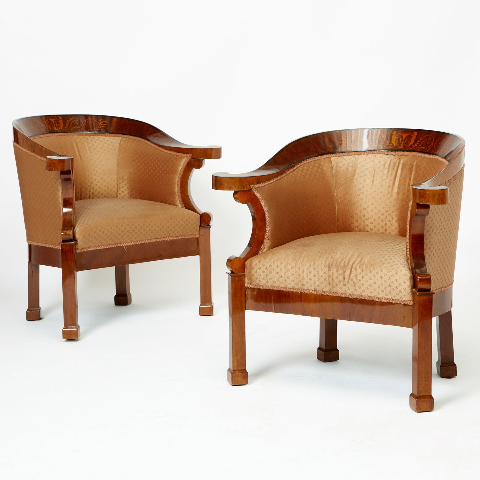 Pair of Continental Neoclassical Inlaid Mahogany Armchairs: Height 33 1/2 inches, width 35 inches, depth of seat 20 inches, height of seat 17 1/2 inches.