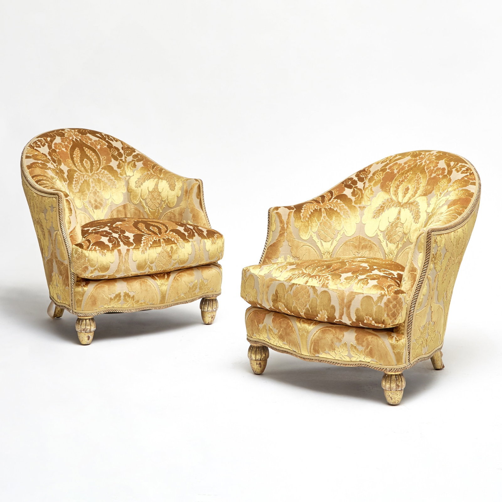 Pair of Italian Giltwood Rope Carved Club Chairs: In gold velvet damask. Height 30 1/2 inches, width 26 1/2 inches, depth of seat 21 inches, height of seat 15 inches.