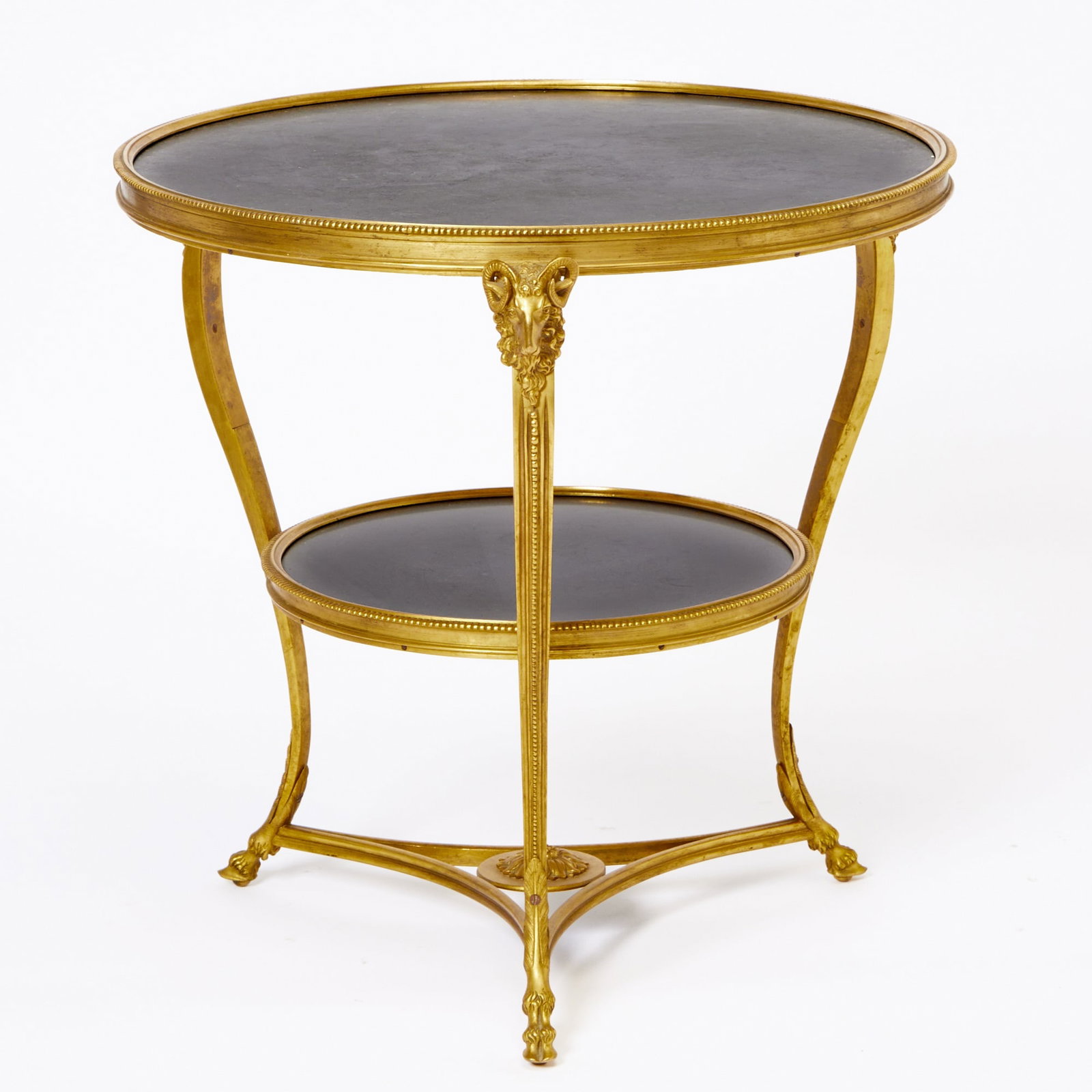 Louis XVI Style Gilt Bronze and Granite Gueridon: 20th Century Height 27 1/4 inches, diameter 28 inches.