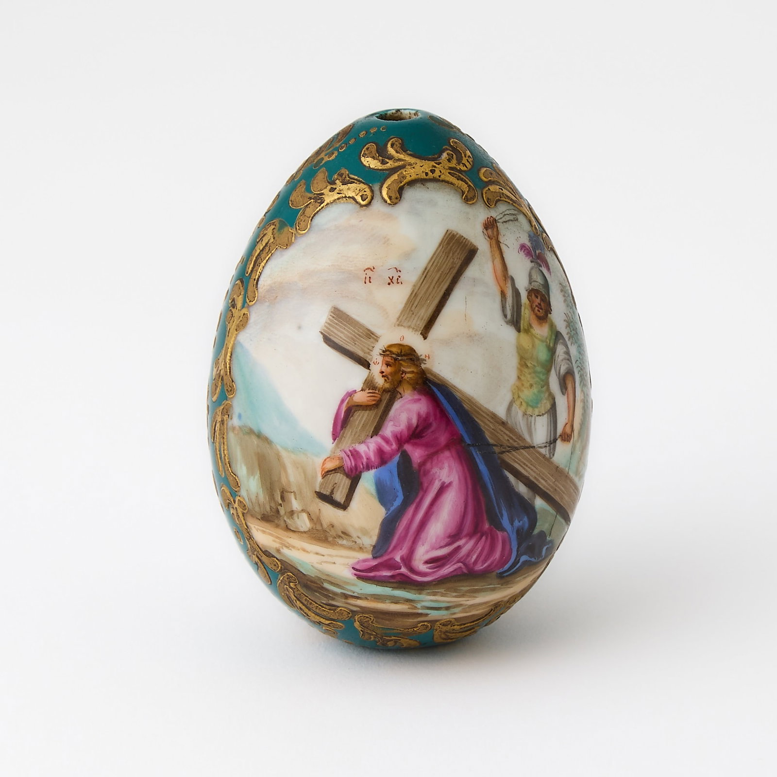 Russian Porcelain Easter Egg: 19th century Depicting Christ carrying the cross. Height 3 inches.