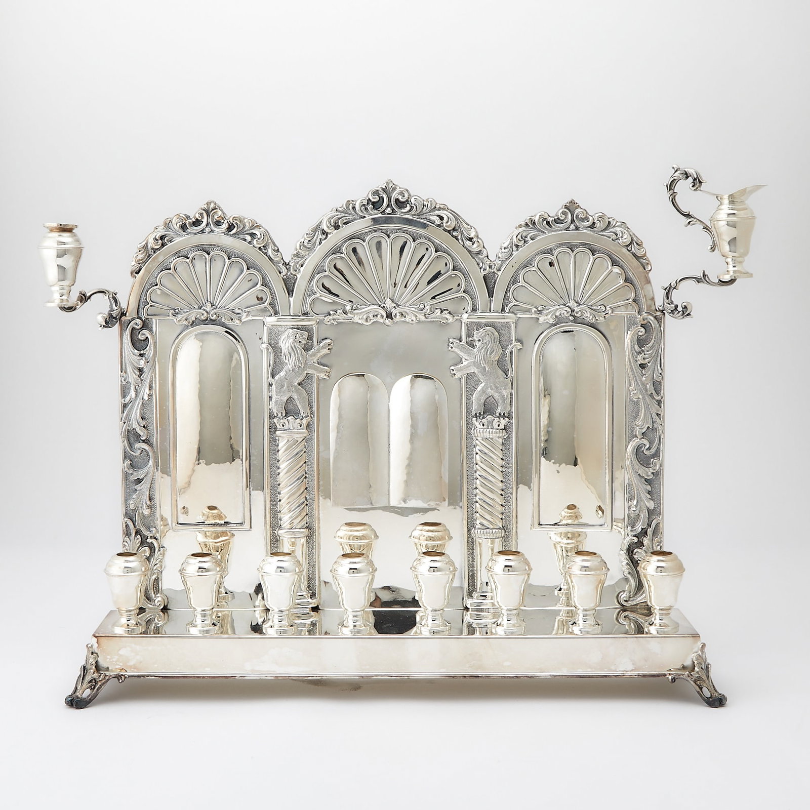 Italian Sterling Silver Menorah: Mazzucato, Milan, late 20th century Height 11 3/4 inches, length 15 1/4 inches, approximately 39 ounces.