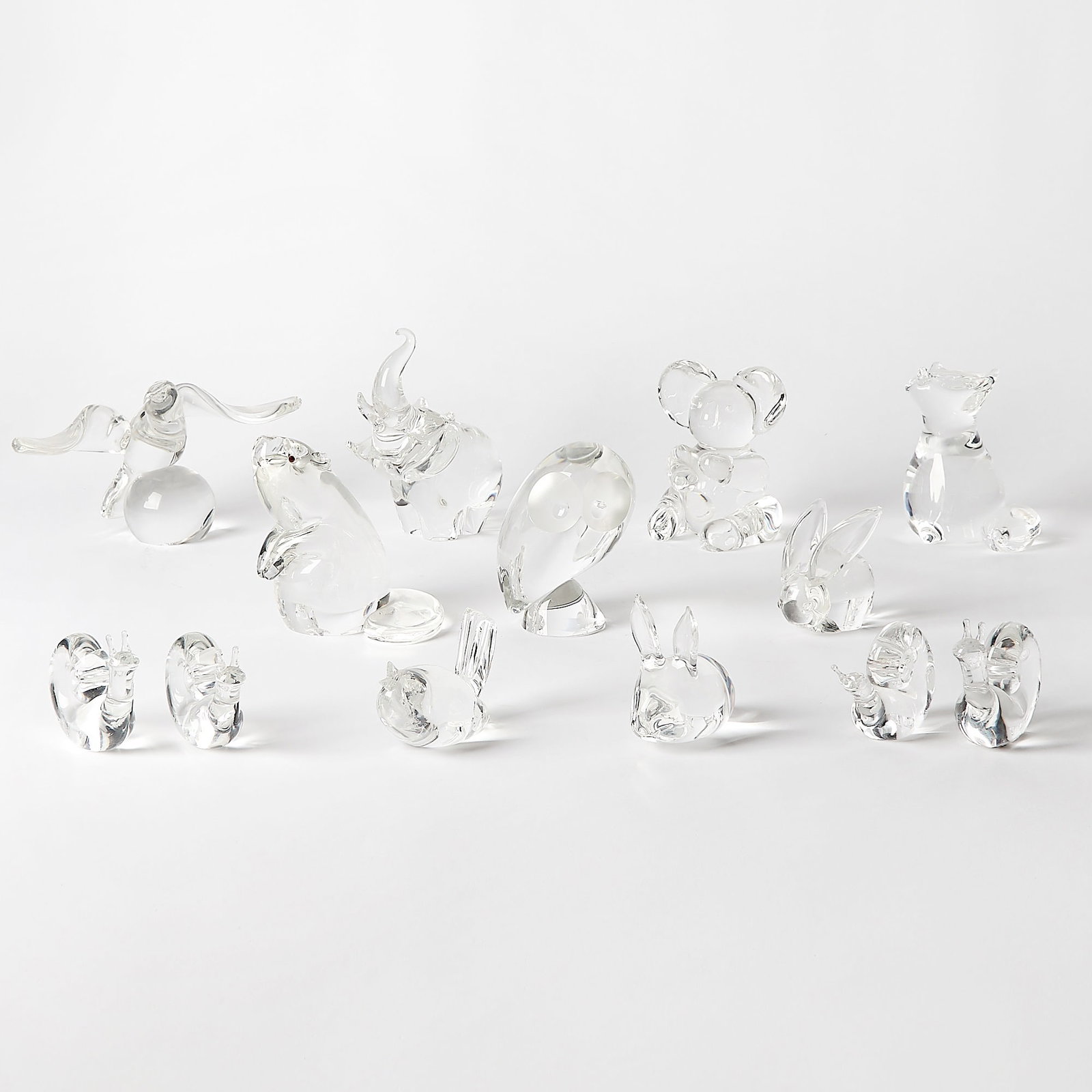 Group of Fourteen Steuben Glass Figures: Height of largest 7 1/4 inches.