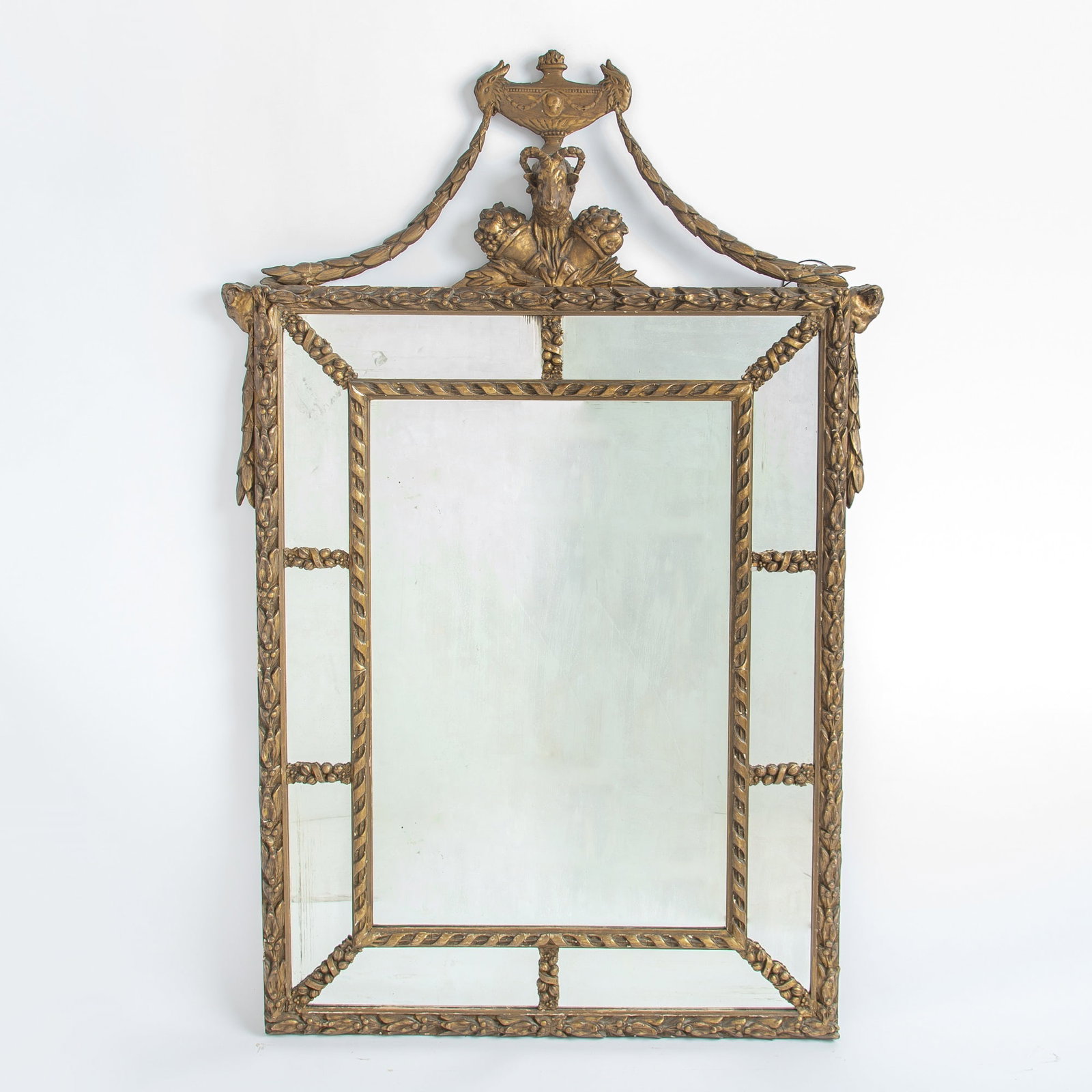 Louis XVI Giltwood and Composition Mirror: Height 56 inches, width 36 inches.