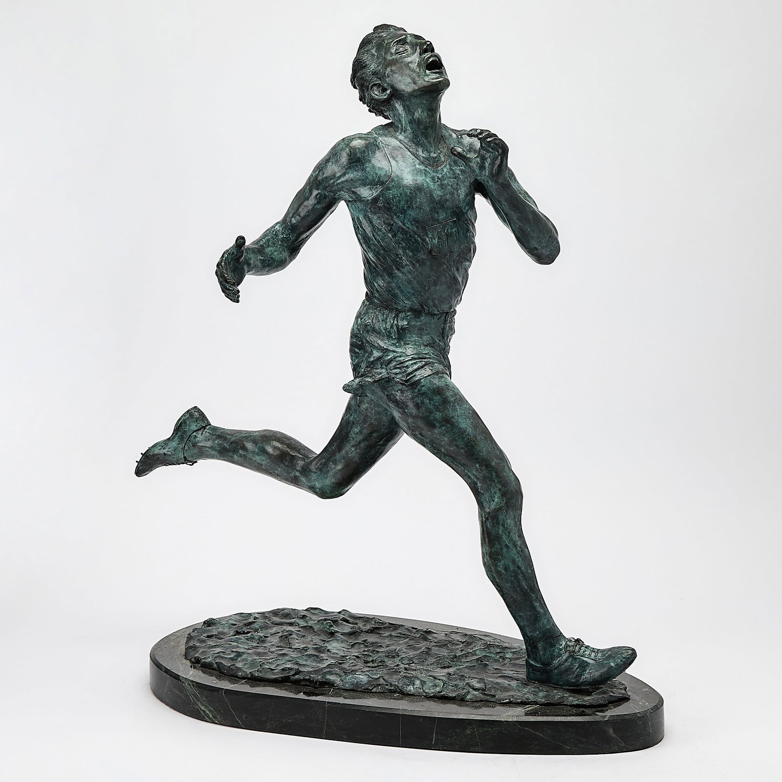Gary Eriksen Patinated Bronze Figure Titled "Four Minute Mile": On a marble base. Height 24 1/2 inches. (24 3/4 inches high)