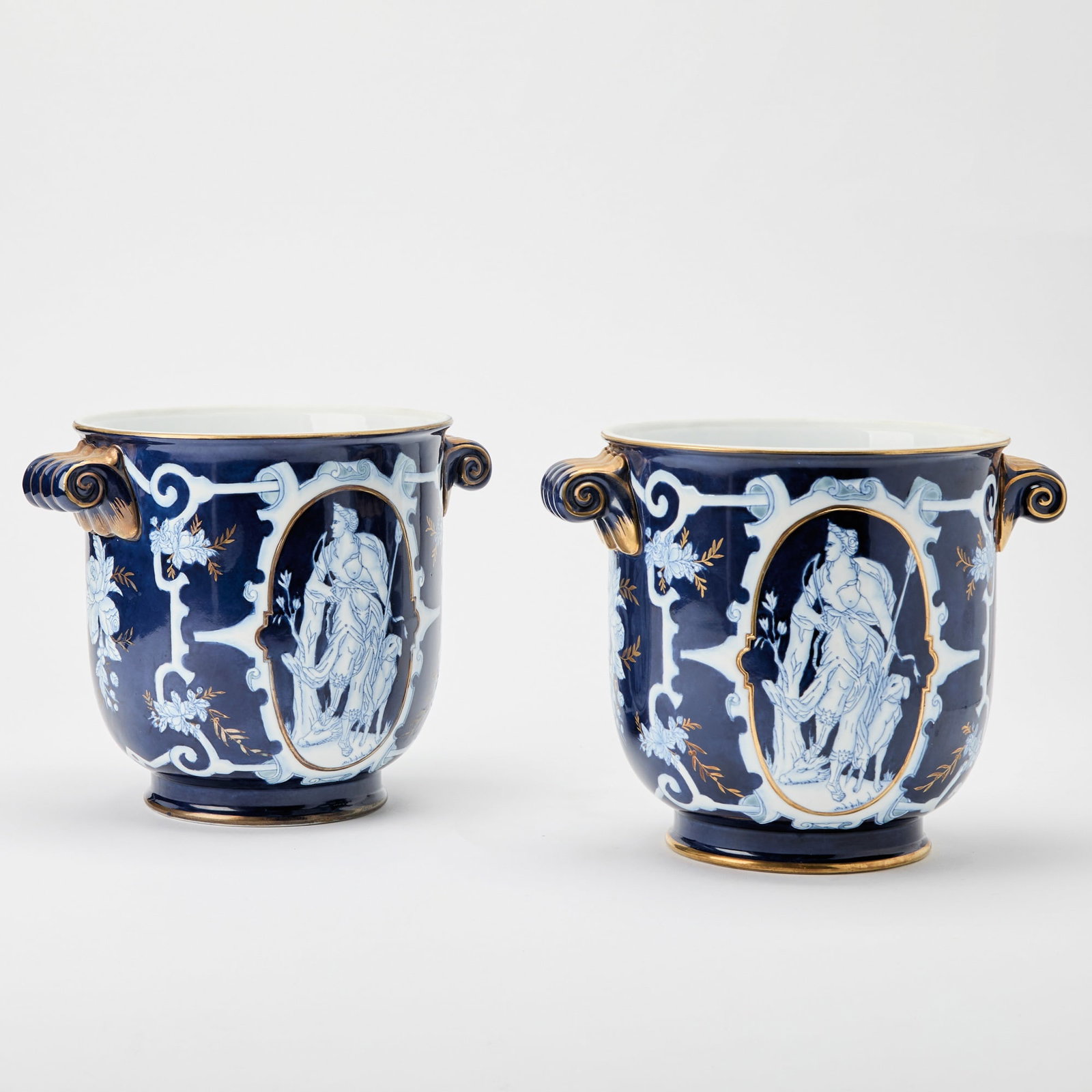 Pair of Porcelain Blue and White Cachepots: Modern Height 8 inches, diameter 8 inches.