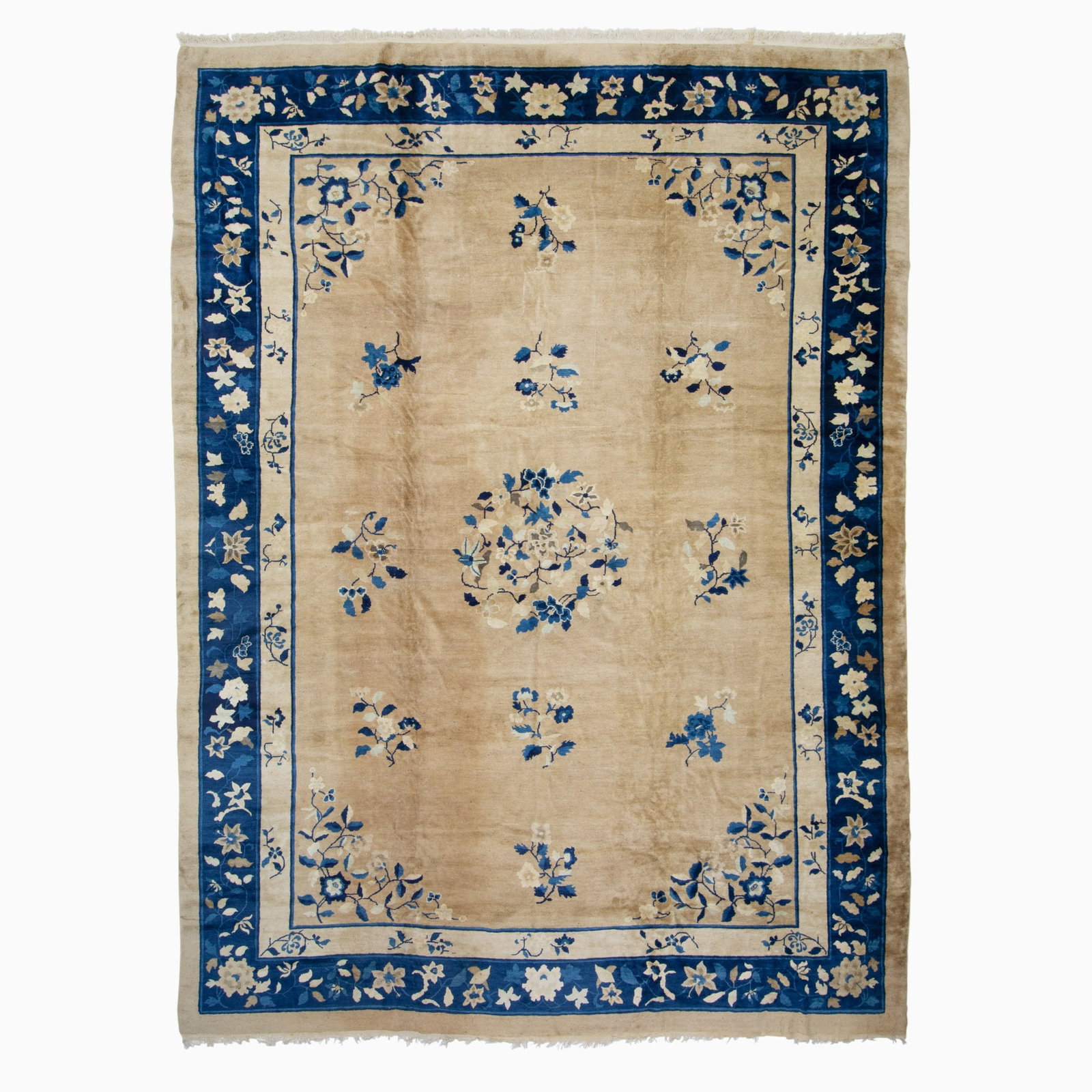 Peking Chinese Carpet: China, First 1/4 20th Century The central circular medallion flanked by sprays on the taupe field is within an indigo meandering floral vinery border. (13' 6" x 9' 10")