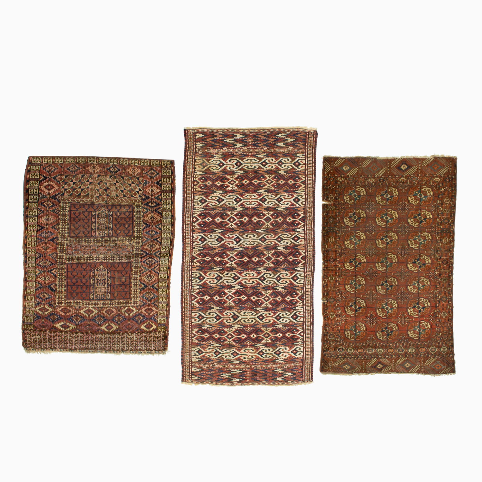 Three Turkoman Rugs: West Turkestan, Early 20th Century A Tekke Ensi, a Tekke Rug, and a Yomud Kilim (5' 0" x 3' 9", 5' 5" x 3' 4", and 6' 8" x 3' 6" respectively)