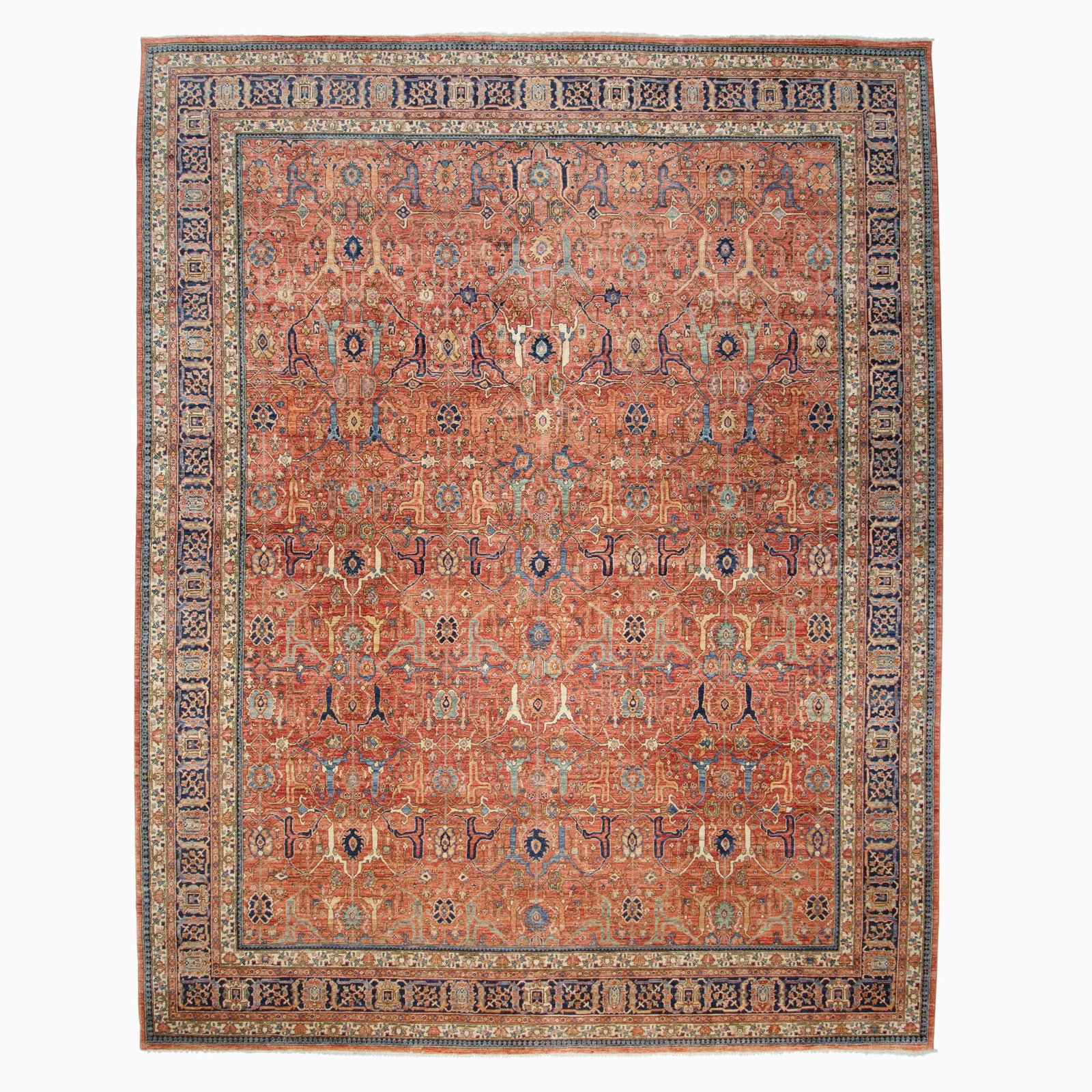 Peshawar Carpet: Pakistan, Contemporary Having a Joshaghan-inspired pattern with an overall pattern of polychrome floral vinery on a madder field within an indigo palmette and leaf border. (15' 2" x 12' 0")