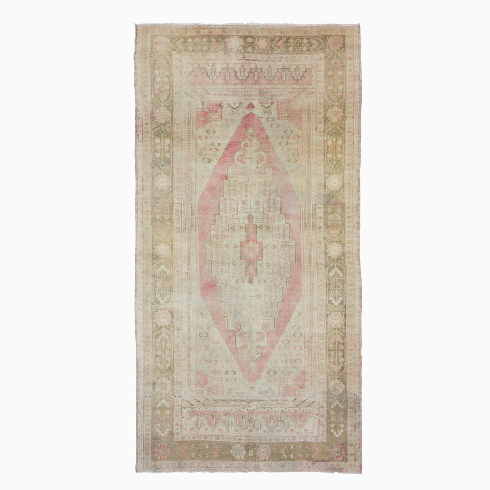 Konya Rug: Central Turkey, Mid-20th Century The central stepped medallion on the pale madder field flanked by ivory spandrels is within an olive rosette border. (8'? 7" x 4' 4")