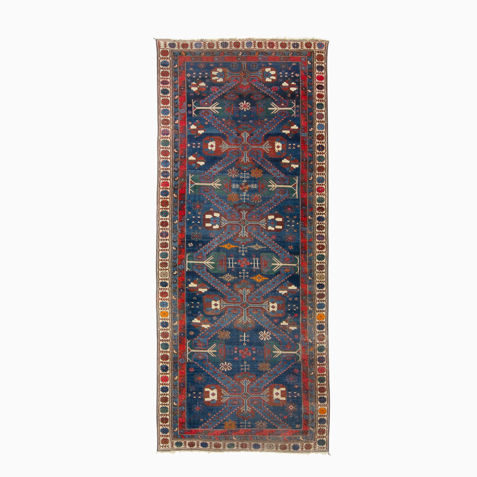 Seychour Gallery Carpet: Northeast Caucasus, First 1/4 20th Century Five St. Andrew's Cross medallions on the indigo field are within an ivory rosette border. (10' 5" x 4' 7")