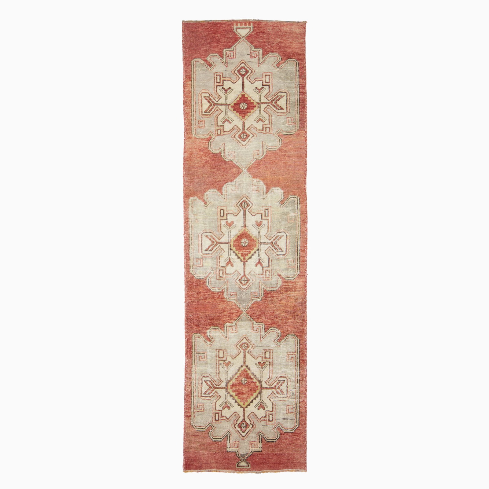 Oushak Runner: West Turkey, Mid-20th Century Three stylized floral medallions are on a madder field. (9' 9" x 2' 8")