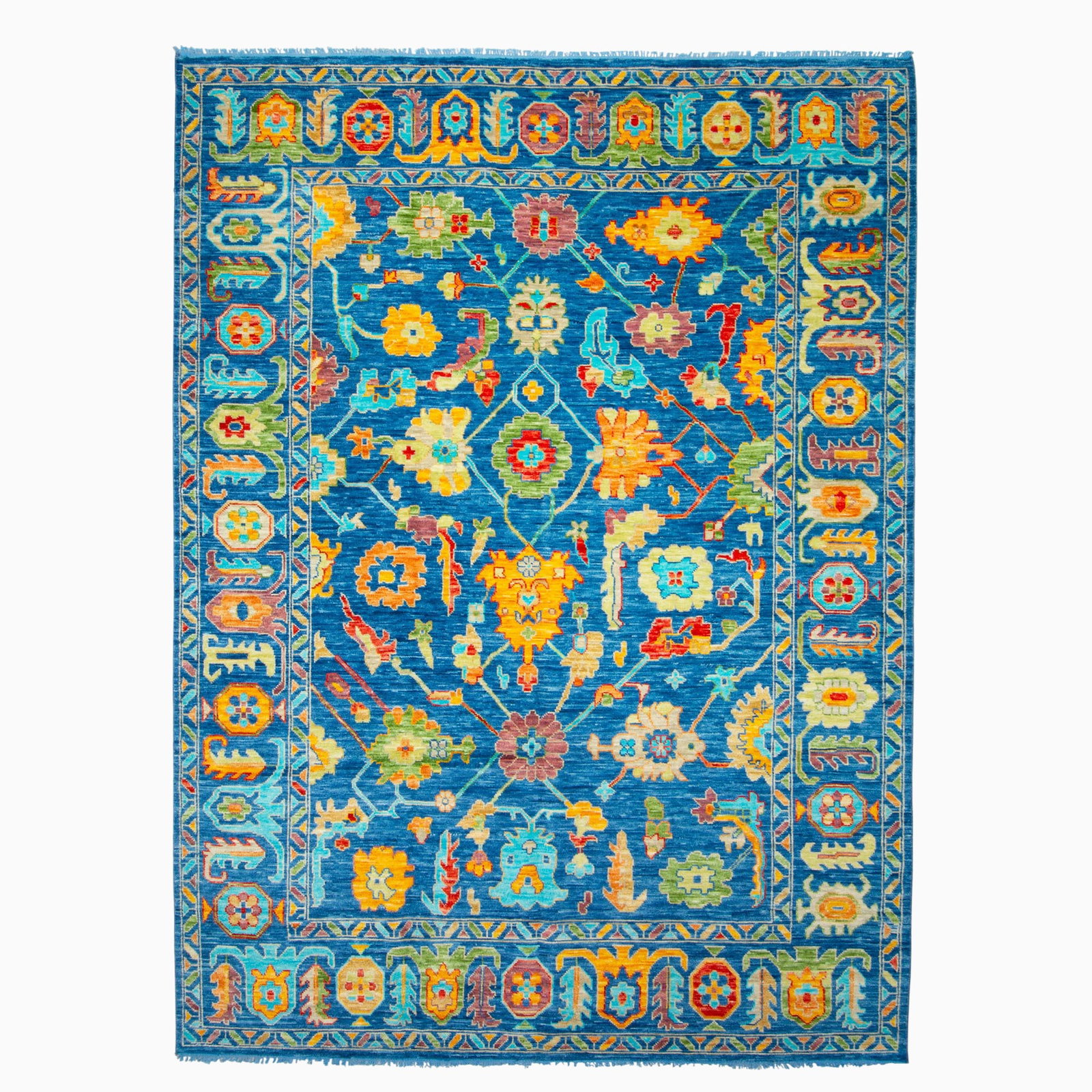 Indo Oushak Carpet: India, Contemporary The allover large-scale polychrome Herati pattern on the indigo field is within a palmette and serrated leaf border. (12' 3" x 9' 1")